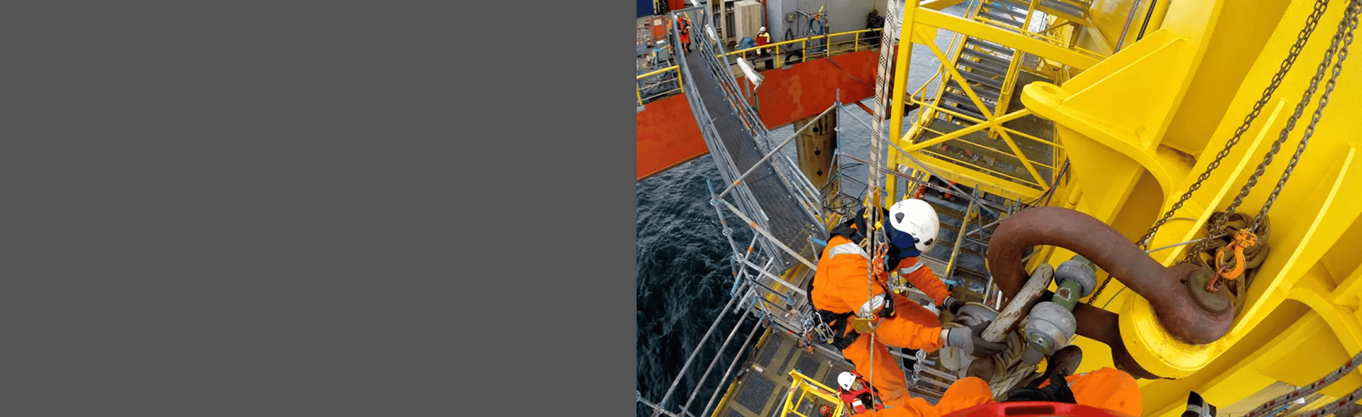 an abstract photo of a curved building with a blue sky in the background