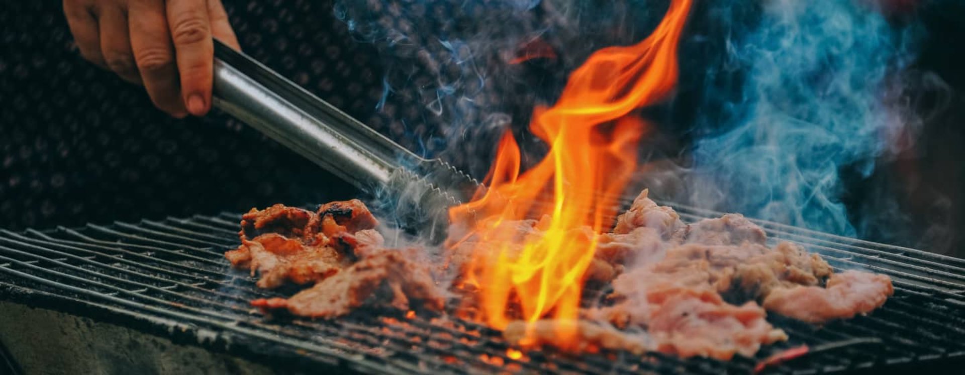 an abstract photo of a curved building with a blue sky in the background