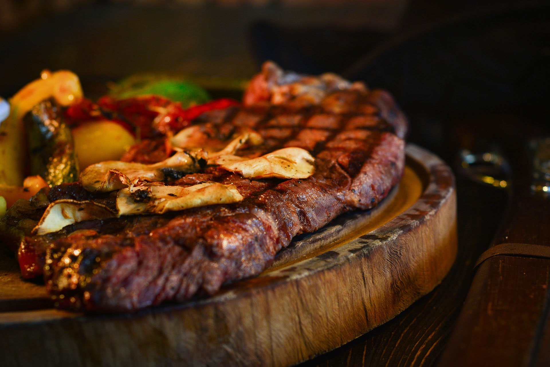 an abstract photo of a curved building with a blue sky in the background