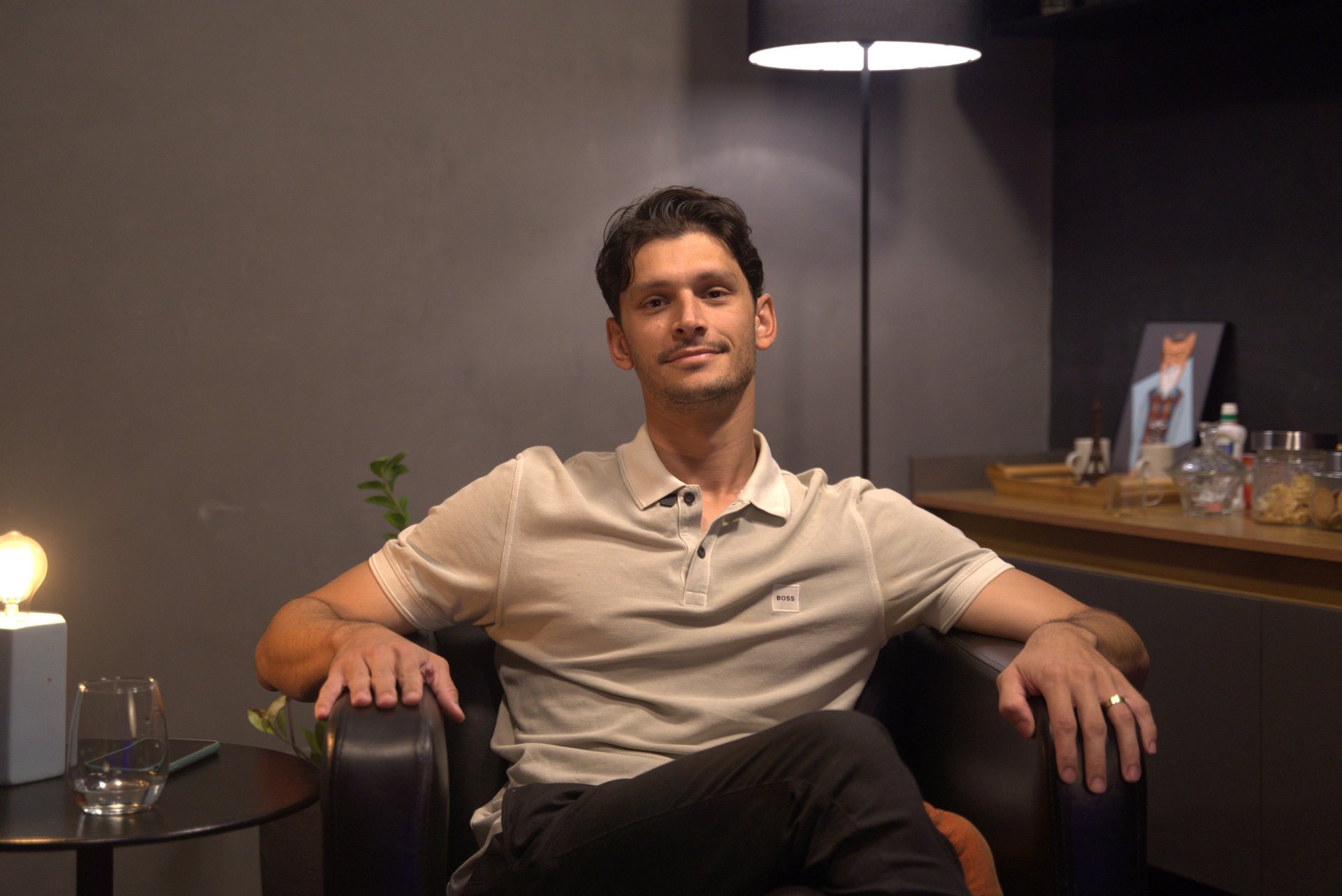 black and brown leather padded tub sofa