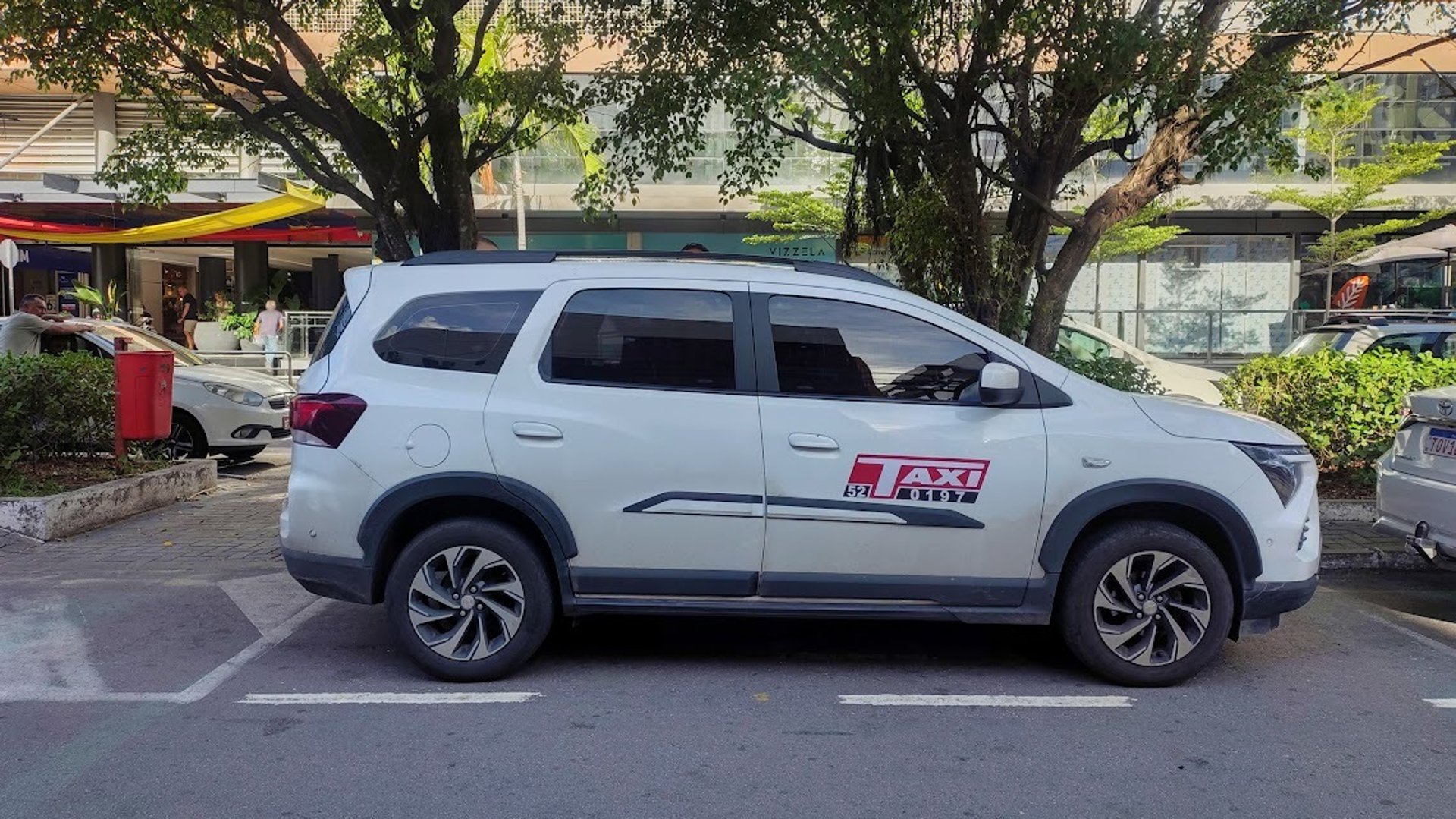 woman wearing yellow long-sleeved dress under white clouds and blue sky during daytime