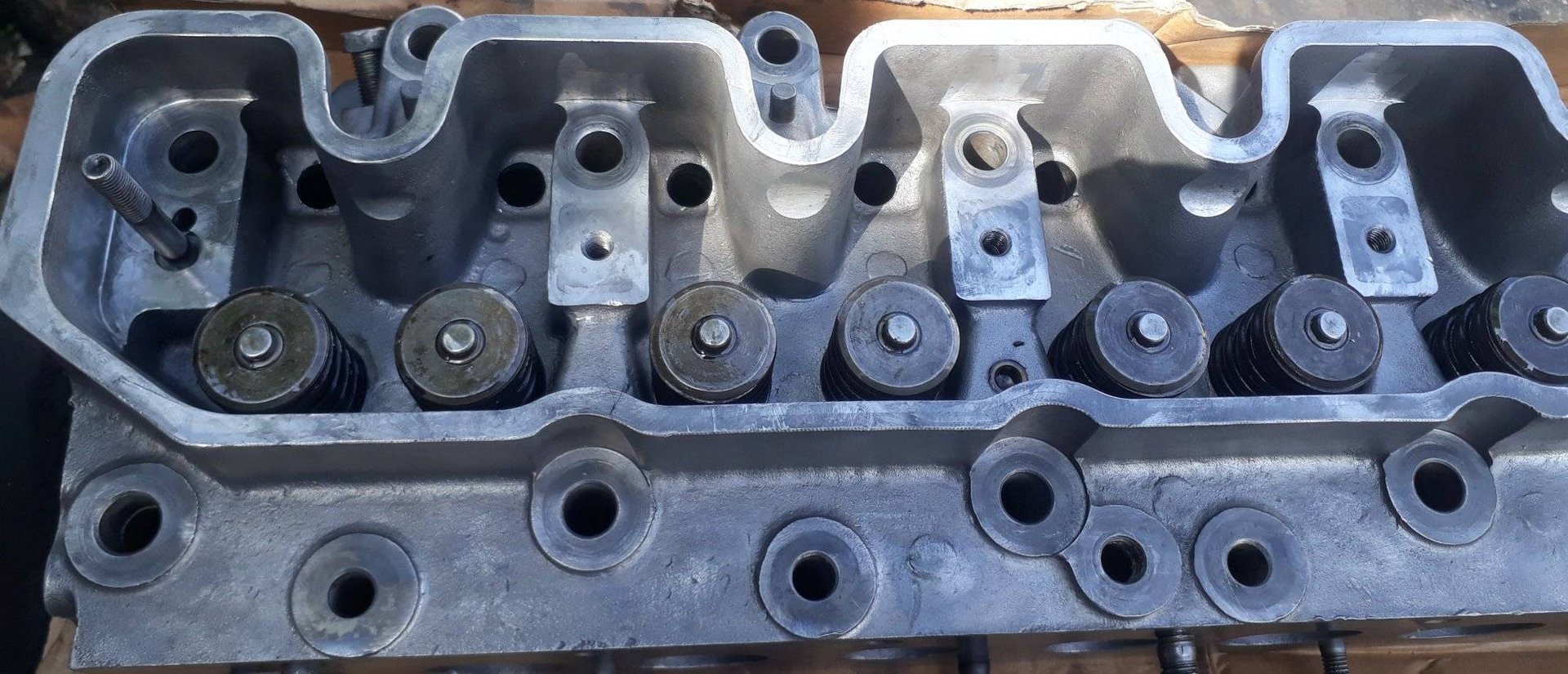 woman wearing yellow long-sleeved dress under white clouds and blue sky during daytime