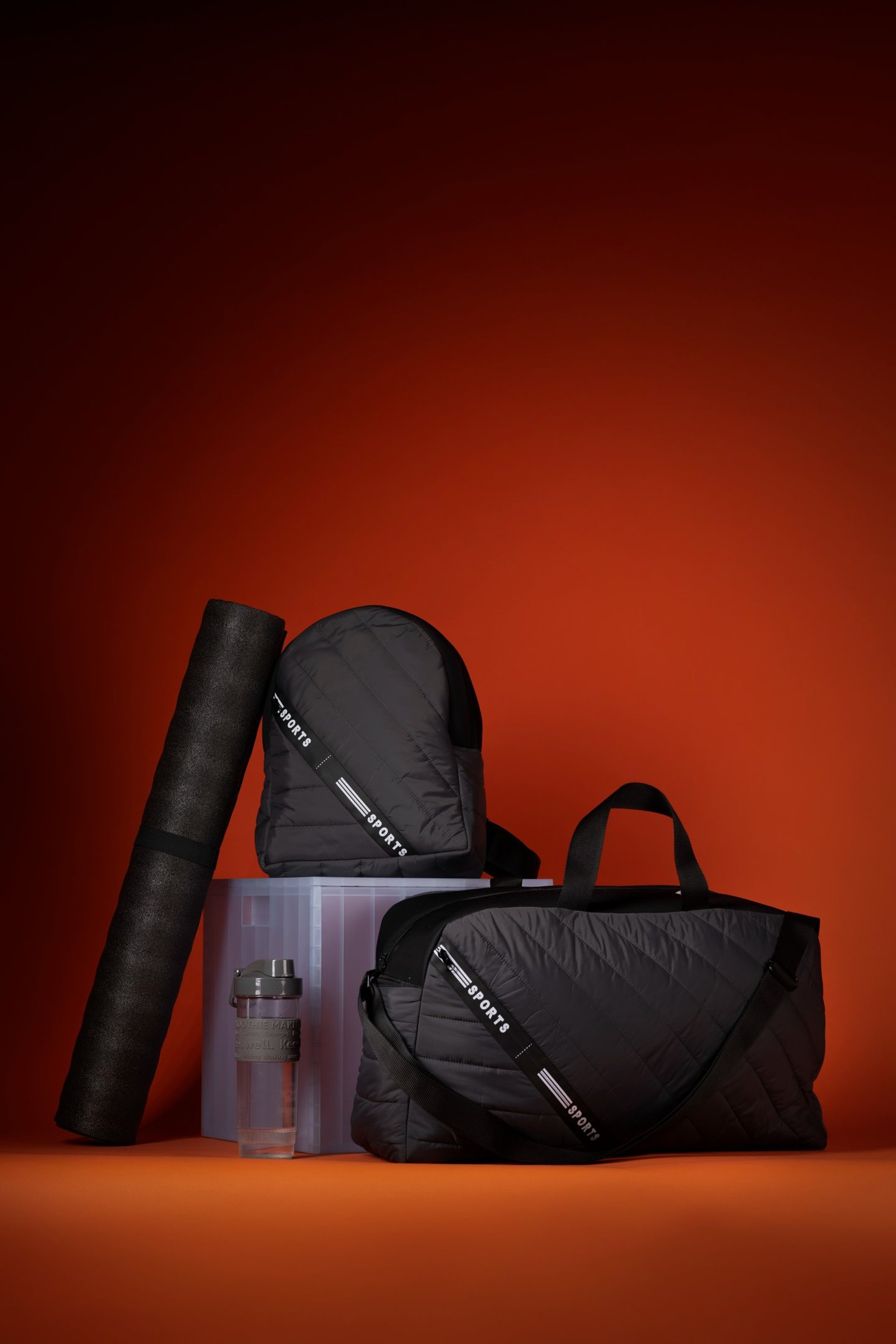 an abstract photo of a curved building with a blue sky in the background