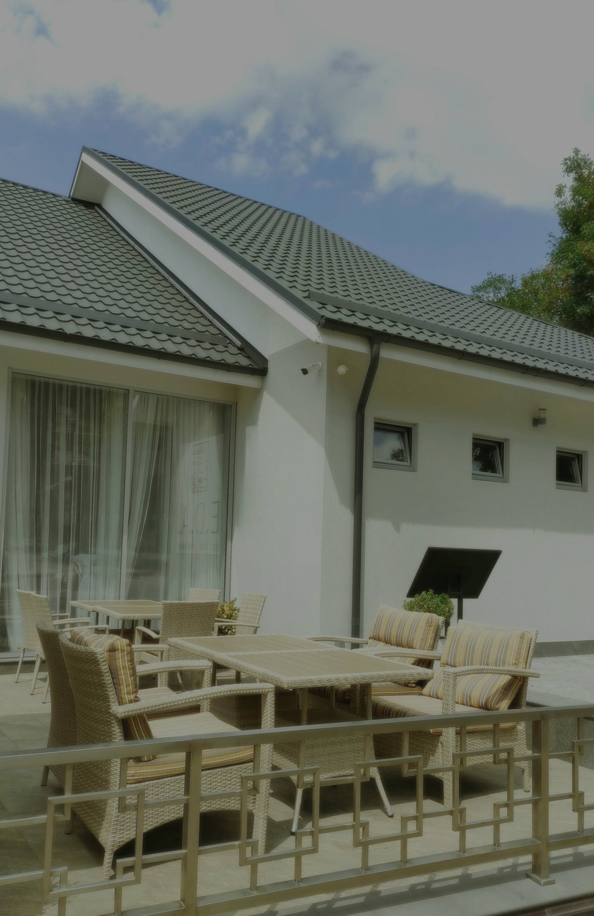 black and brown leather padded tub sofa