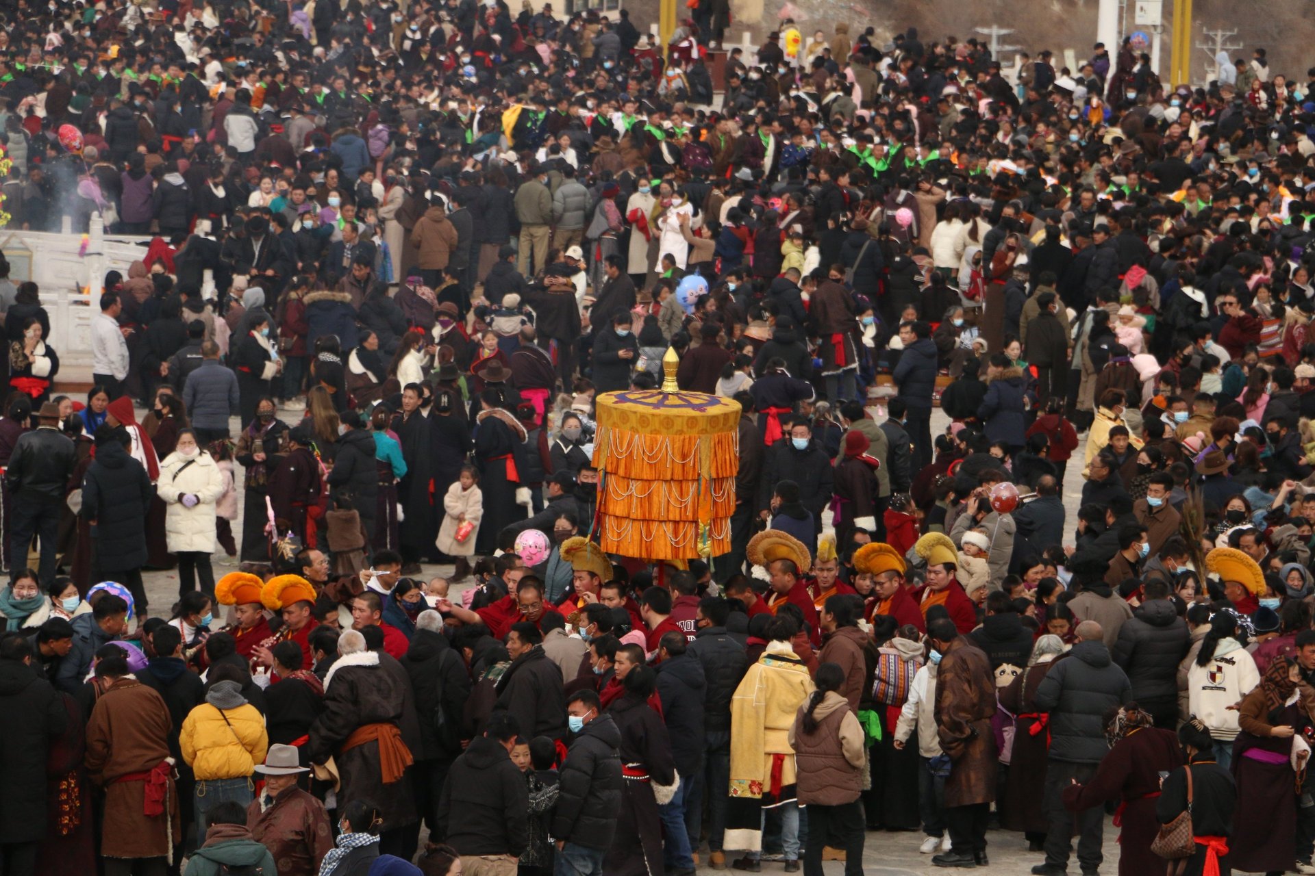 a man and a woman walking down a street