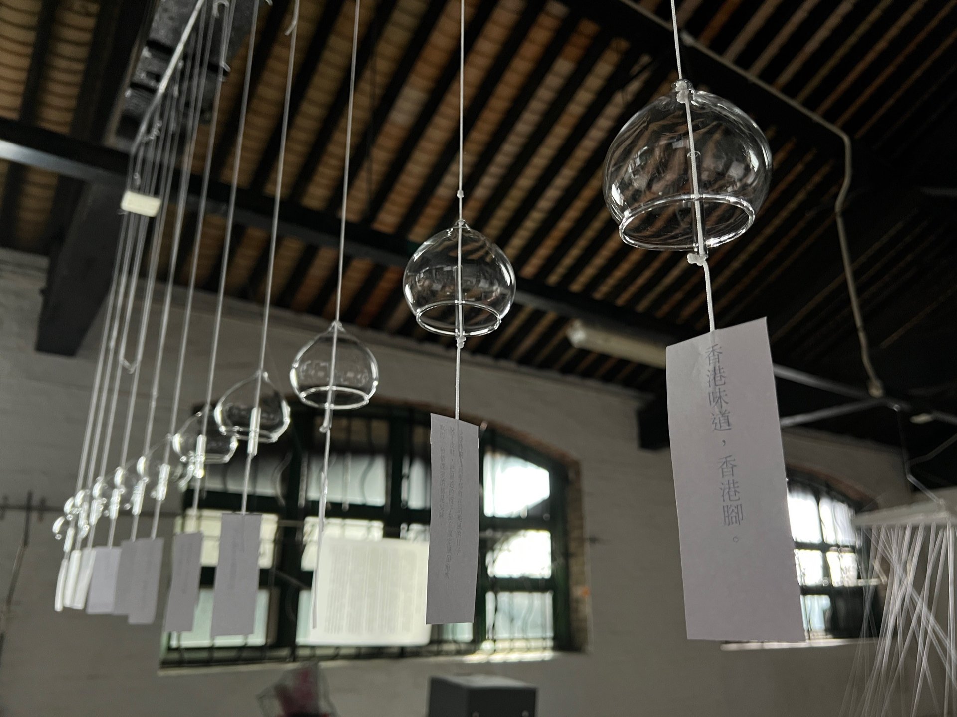 People are viewing art in a gallery setting.