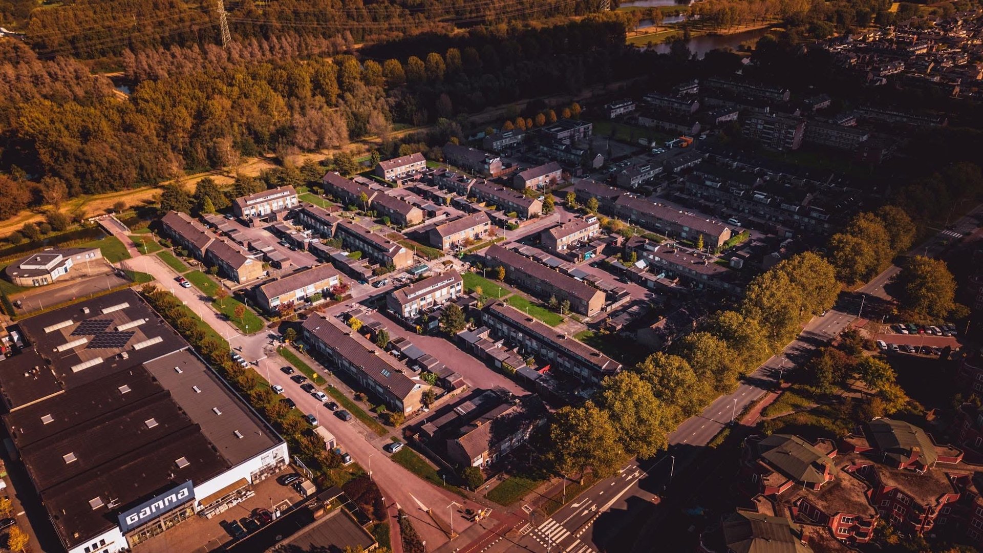 a group of buildings next to a body of water