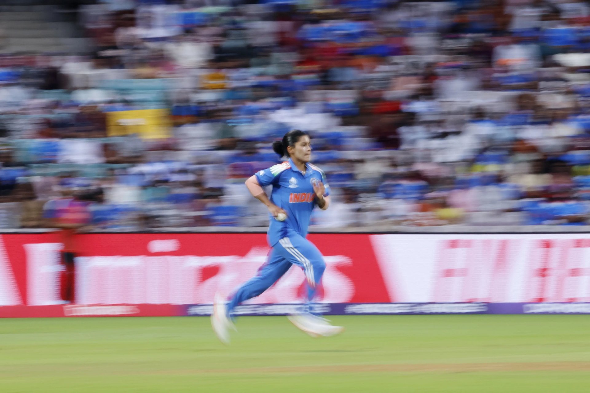 A baseball stadium filled with lots of people