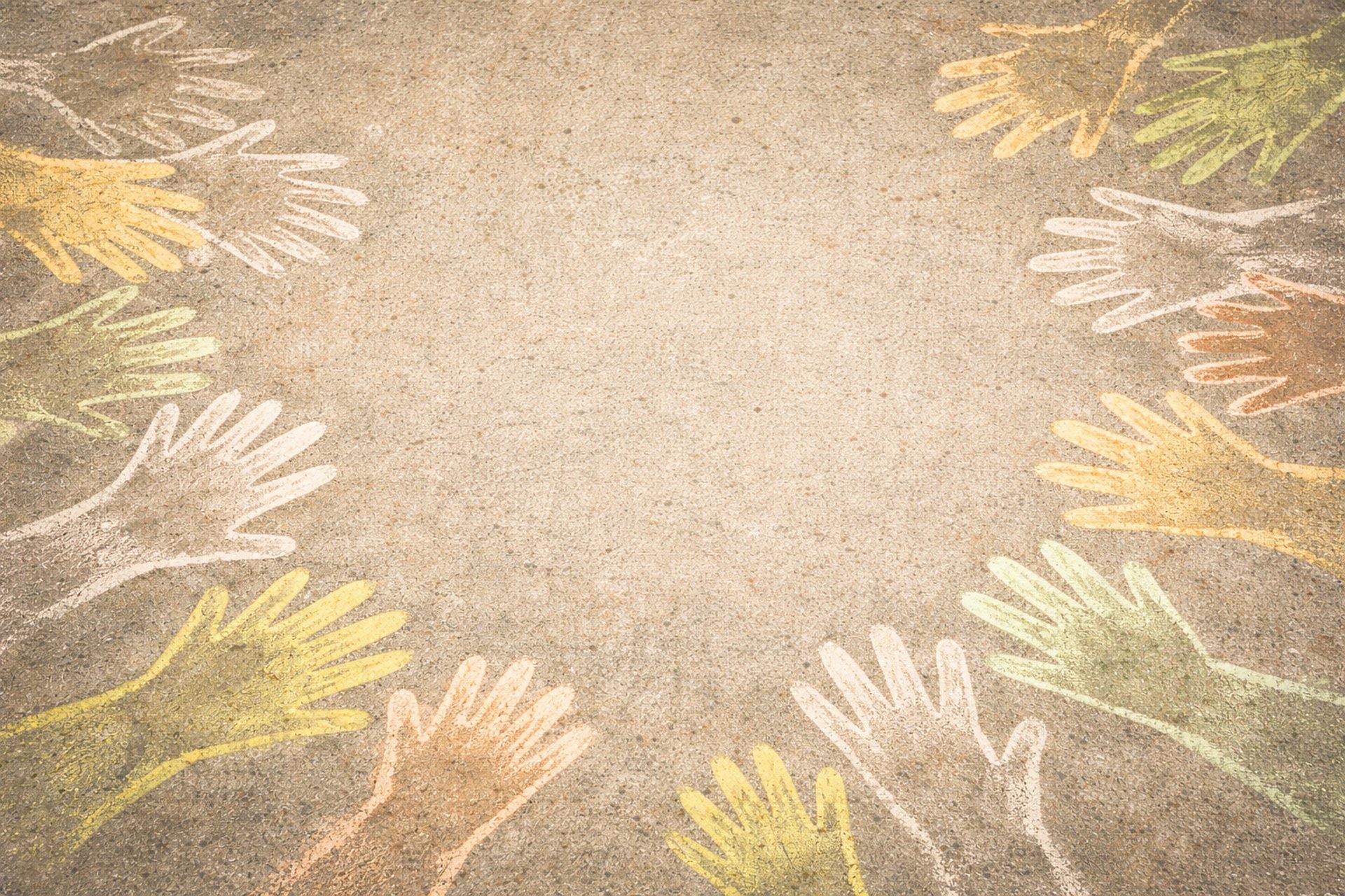 A teacher instructs a group of students in a room.