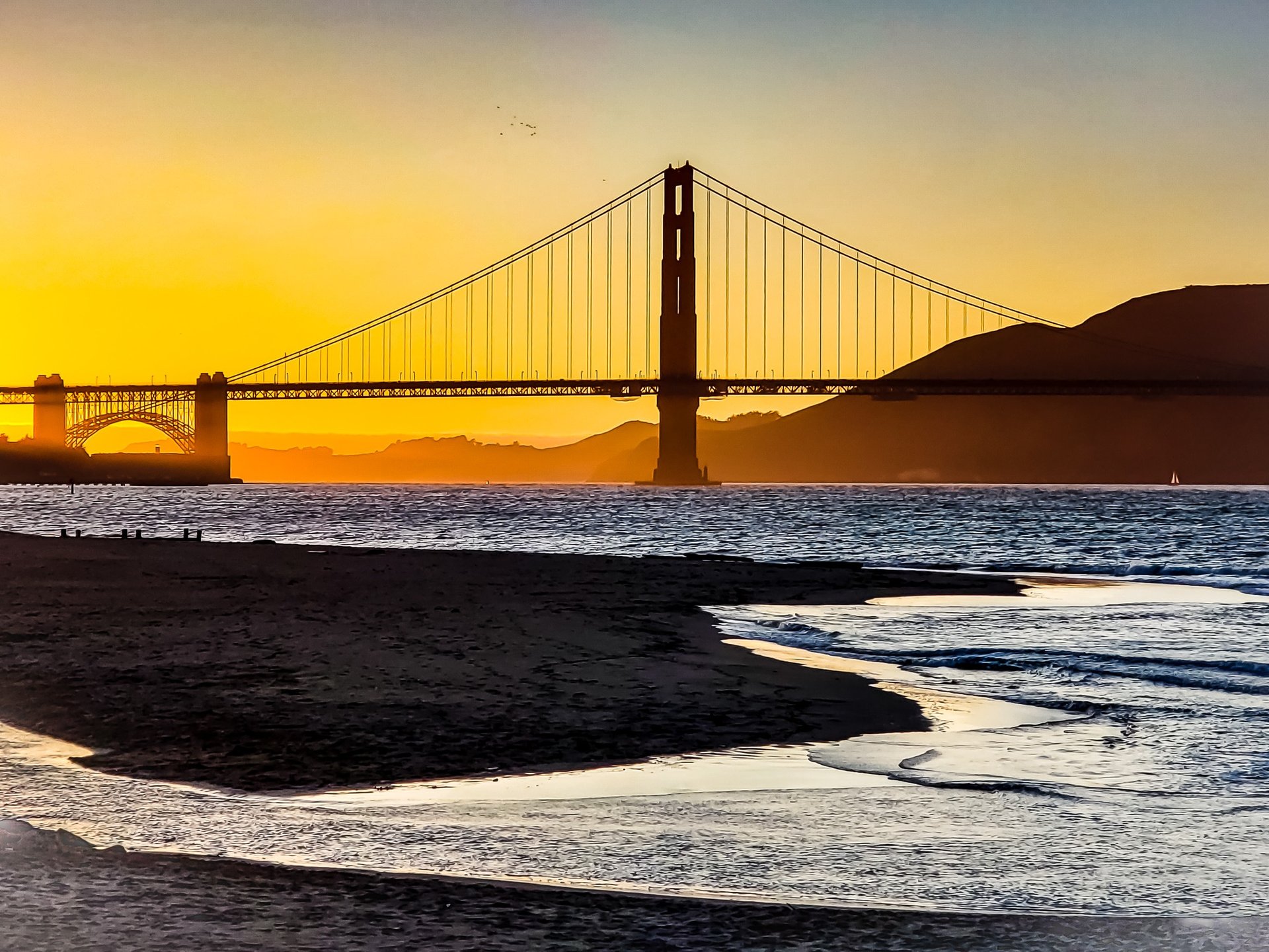 black and brown leather padded tub sofa