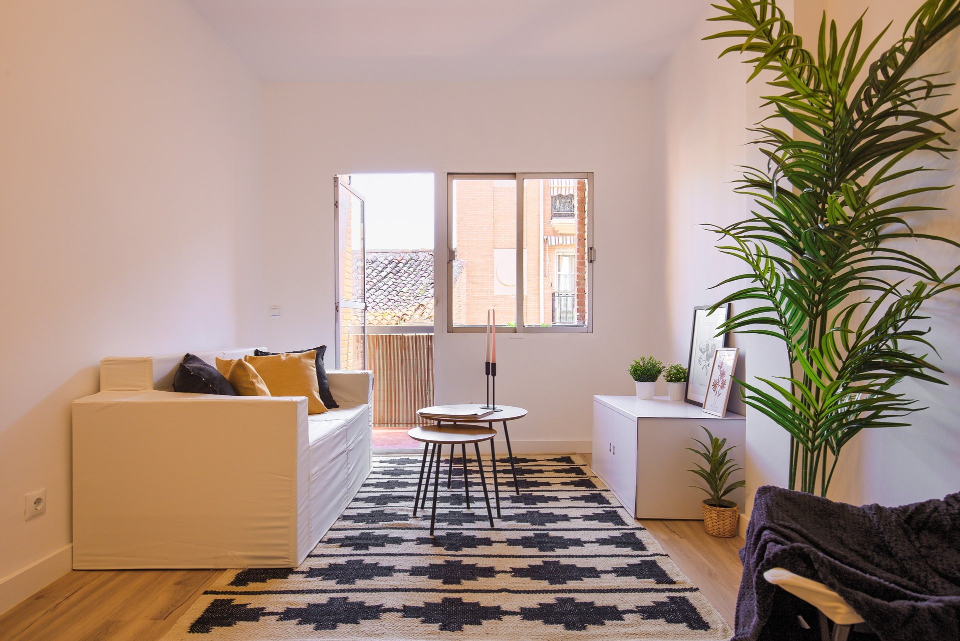 black and brown leather padded tub sofa