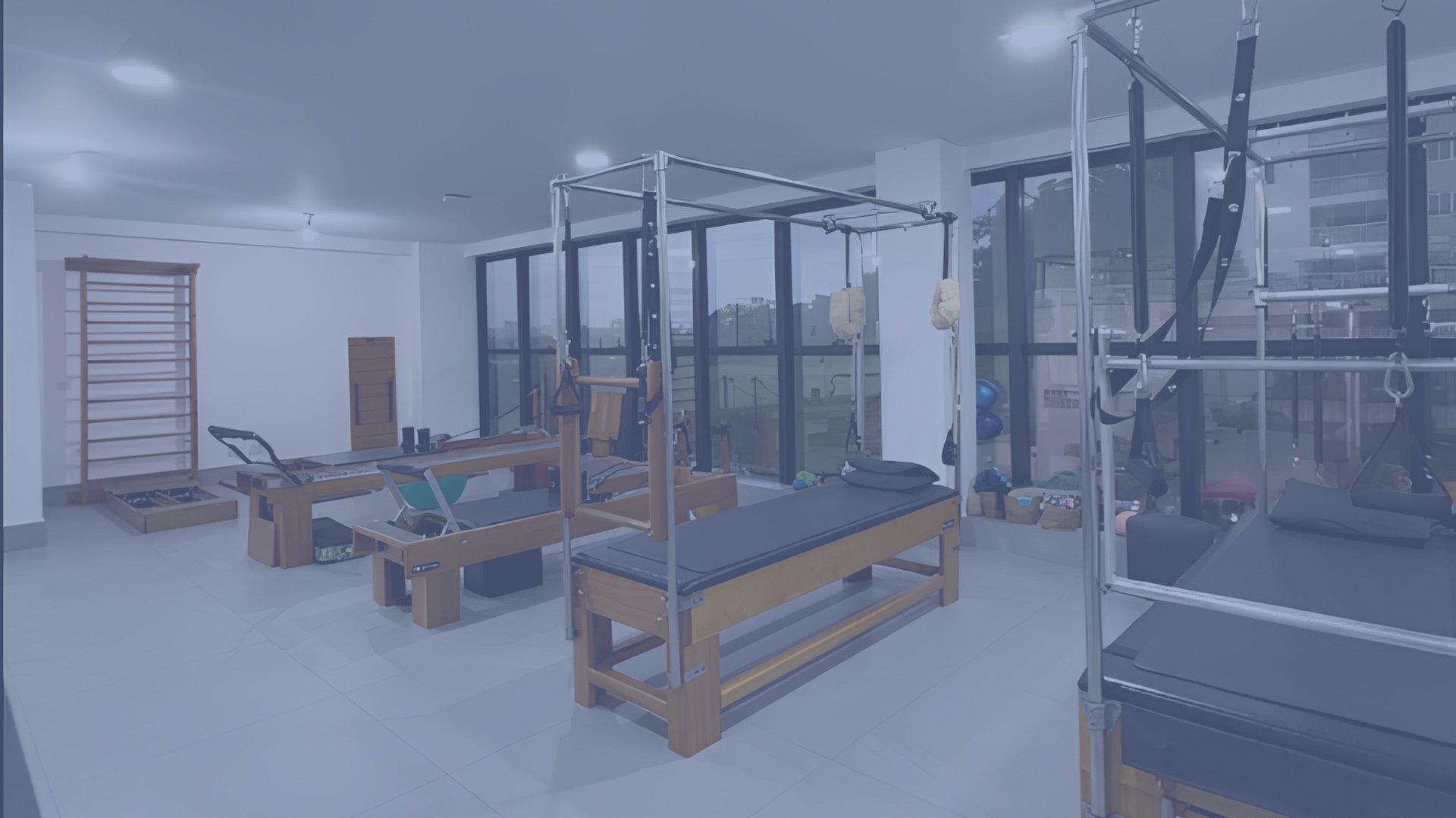 an abstract photo of a curved building with a blue sky in the background