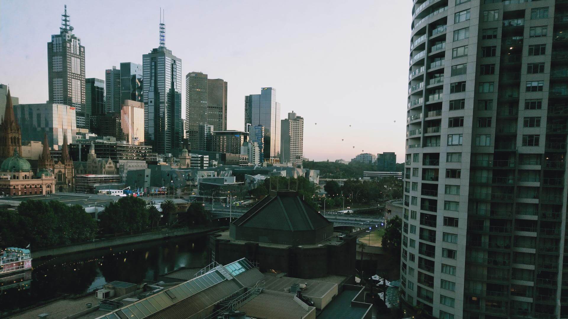 black and brown leather padded tub sofa