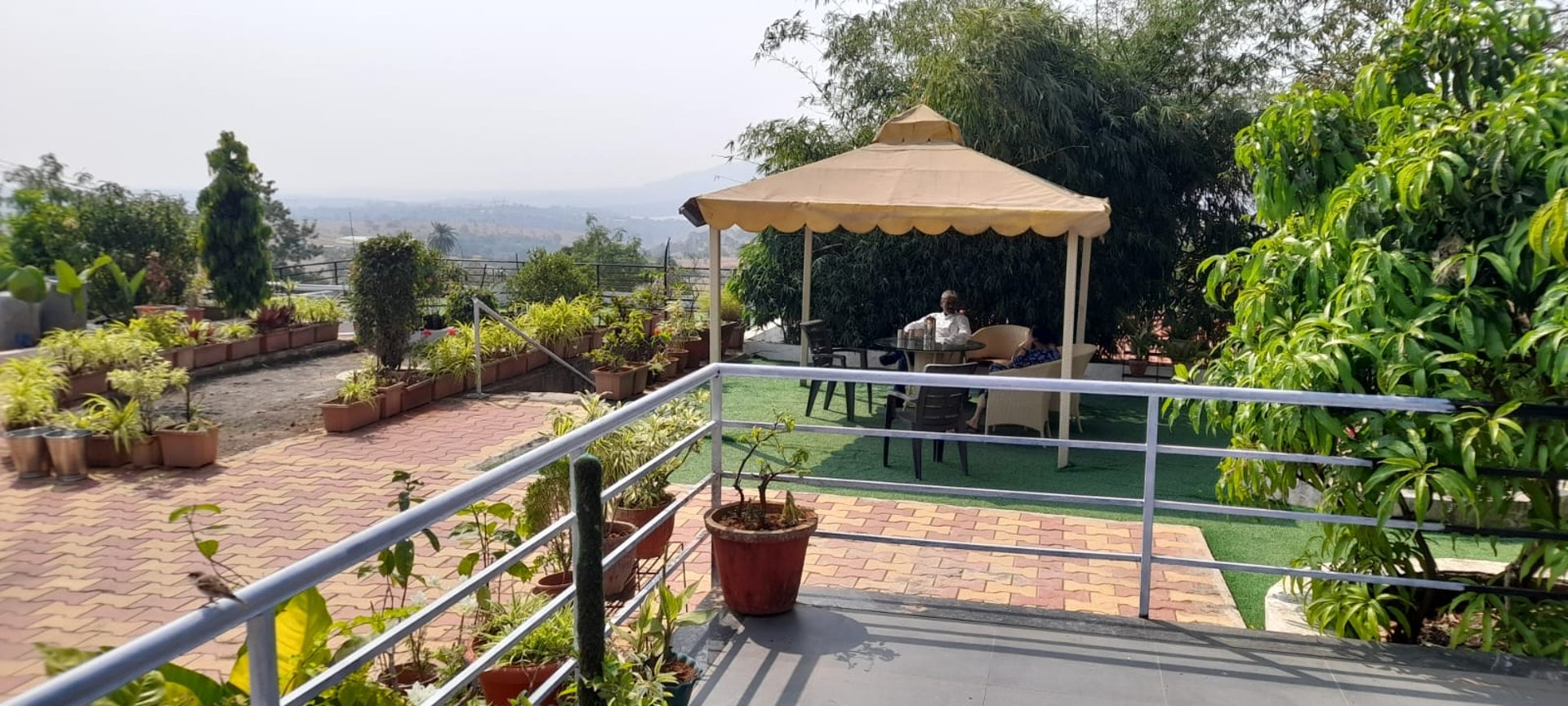 black and brown leather padded tub sofa