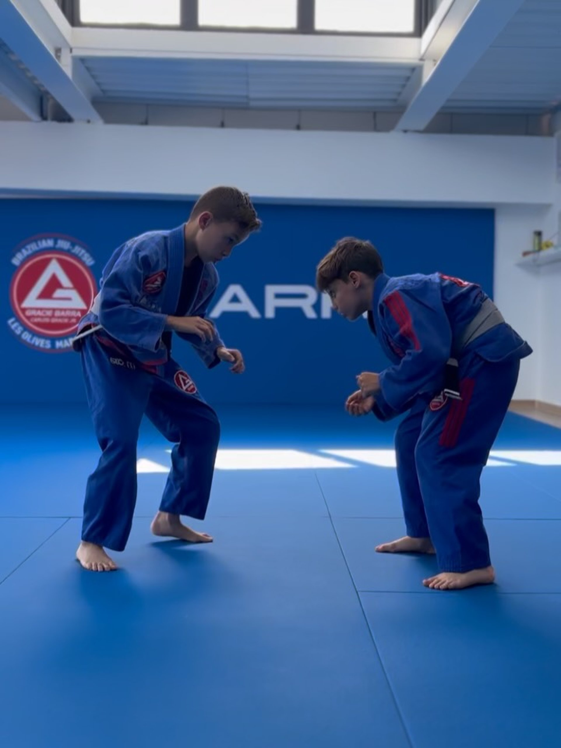 black and brown leather padded tub sofa