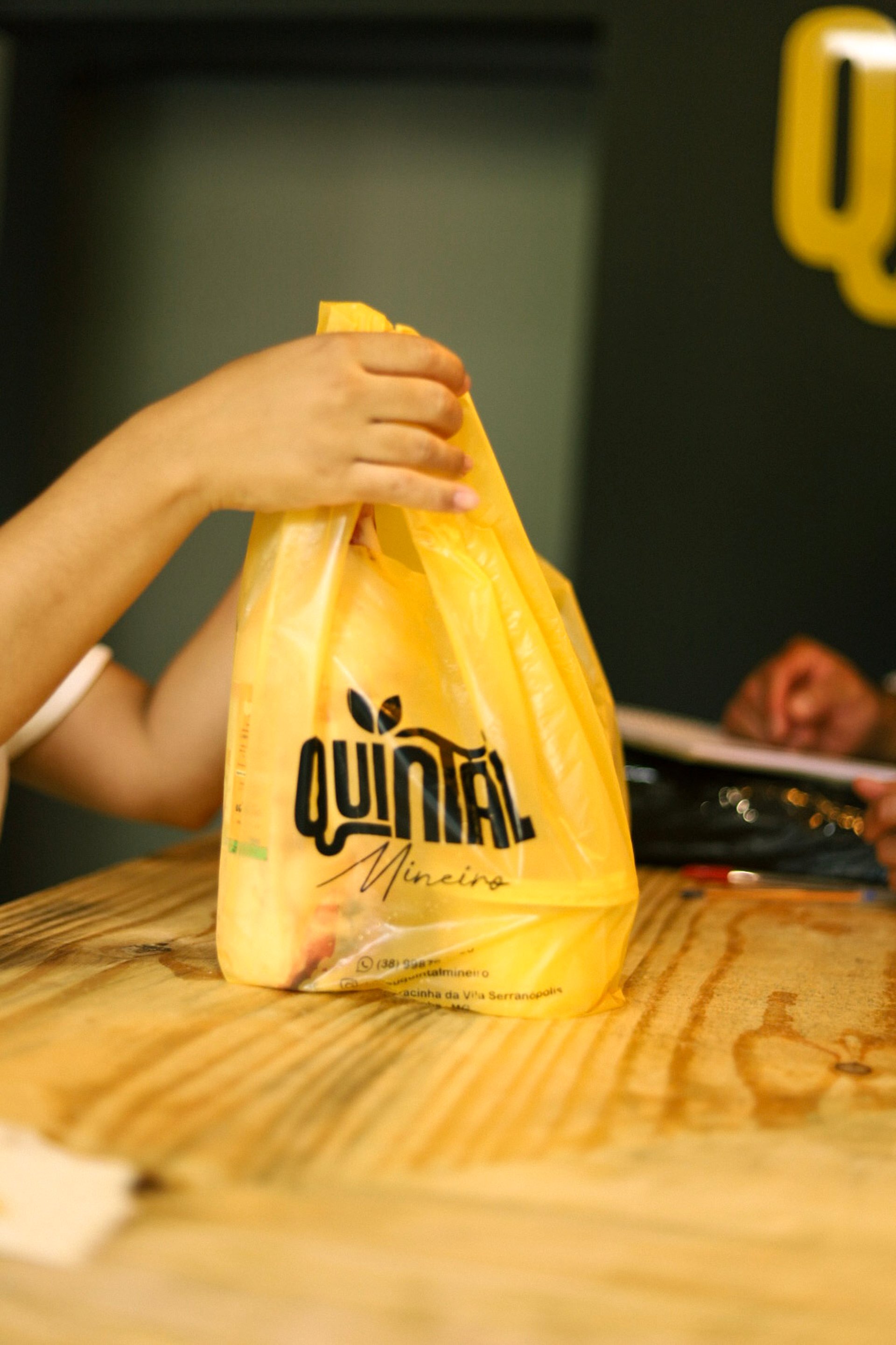 an abstract photo of a curved building with a blue sky in the background