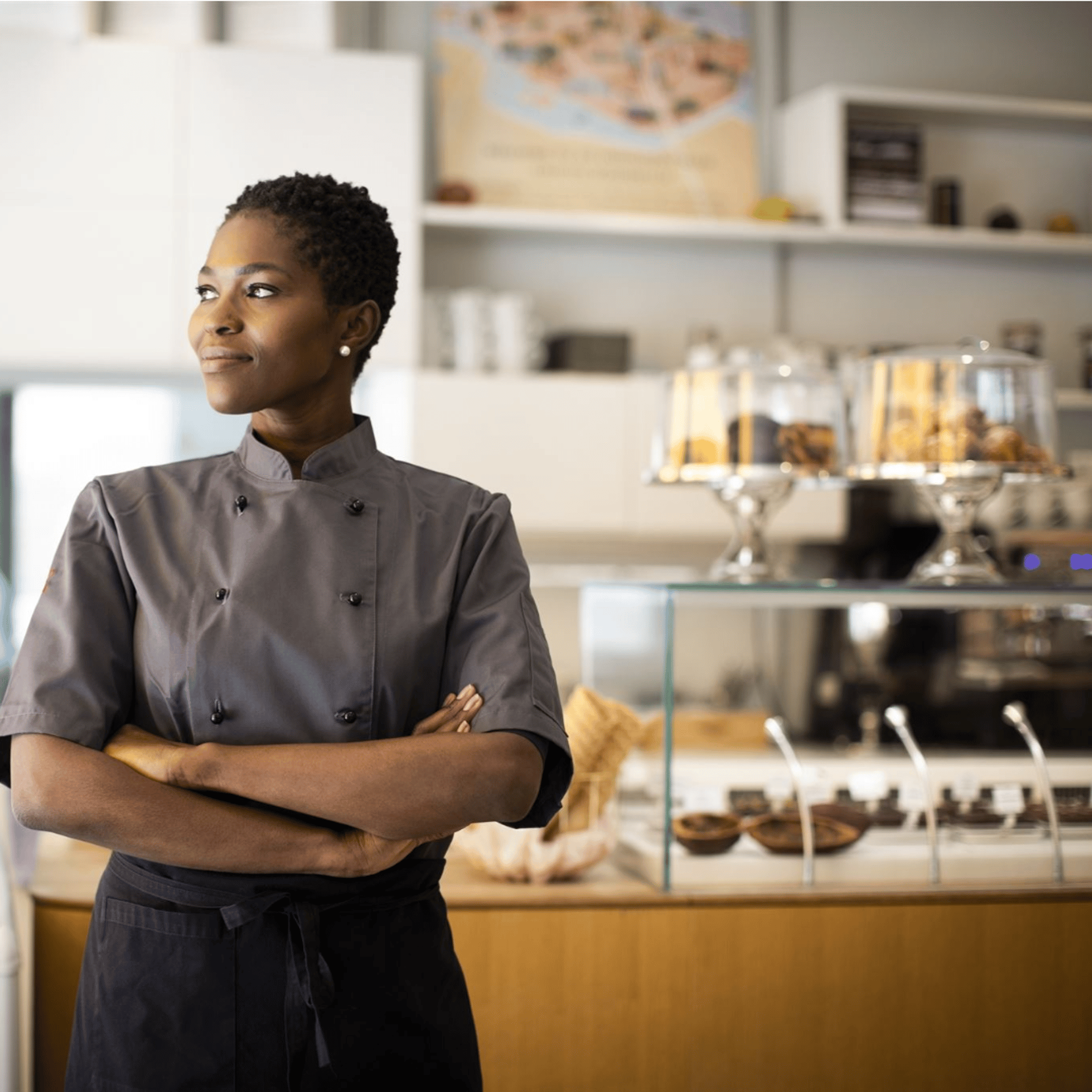 an abstract photo of a curved building with a blue sky in the background