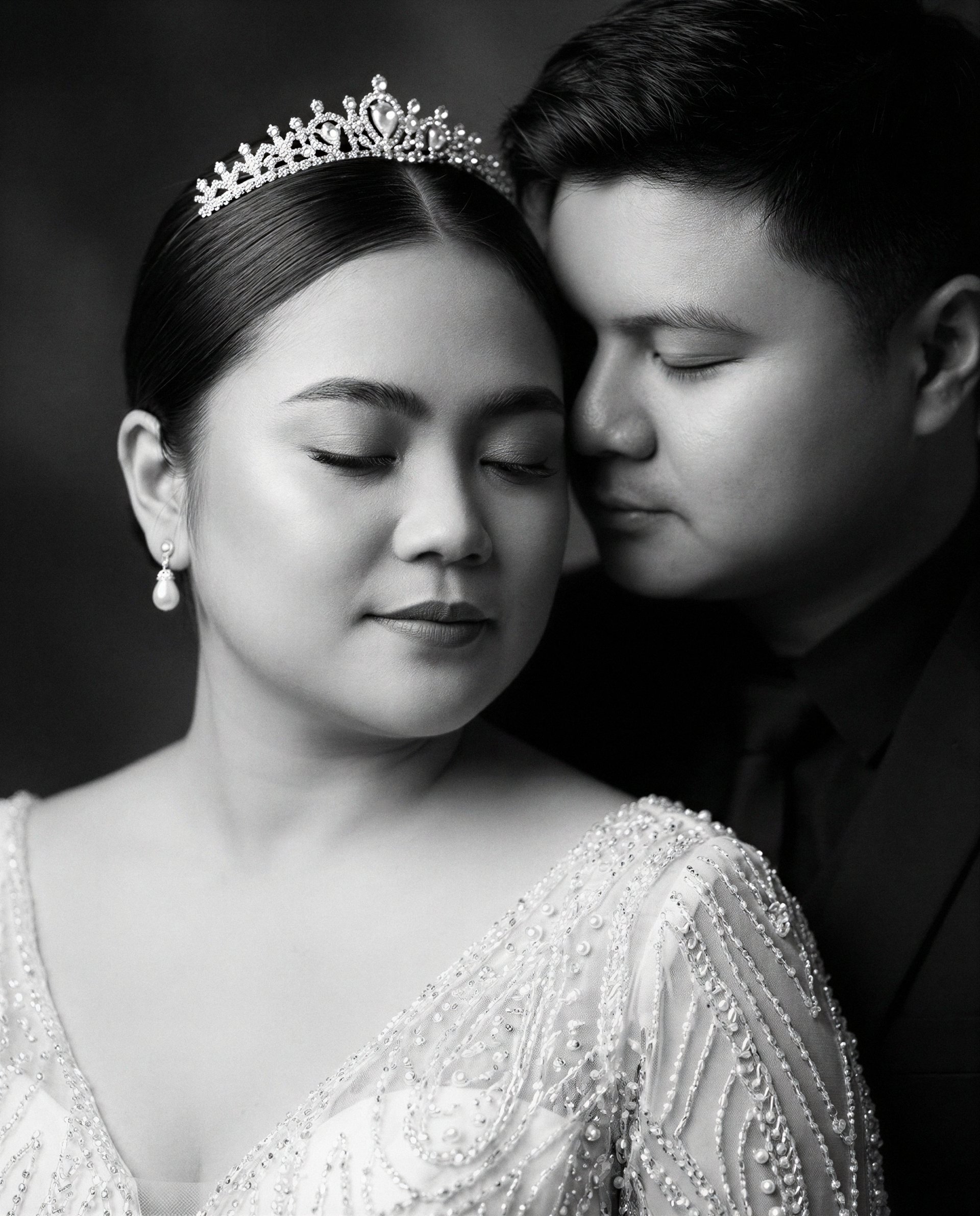 couple wearing silver-colored rings