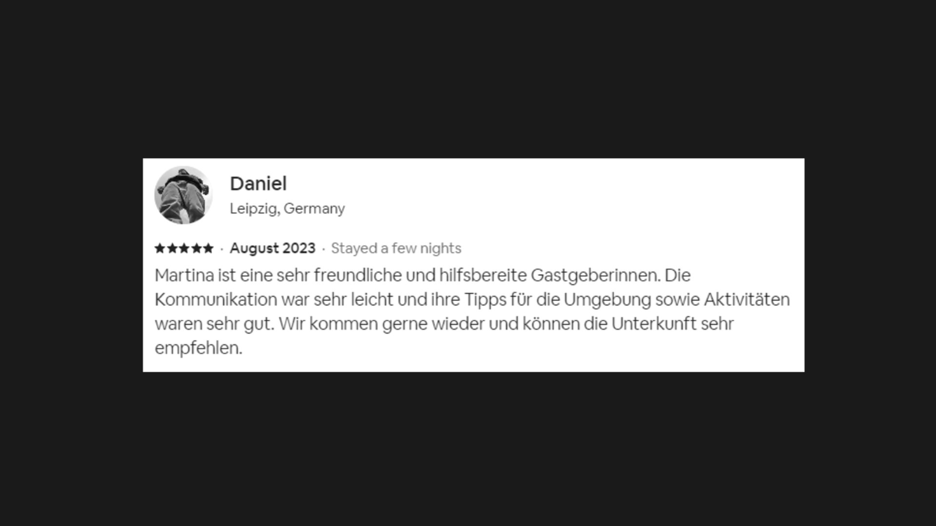 The photo sows a review from a past guest in the Pleasure Palace BDSM Love Apartment, named Daniel.