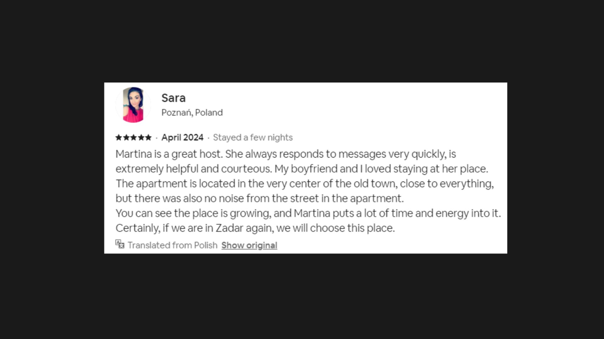 The photo sows a review from a past guest in the Pleasure Palace BDSM Love Apartment, named Sara.