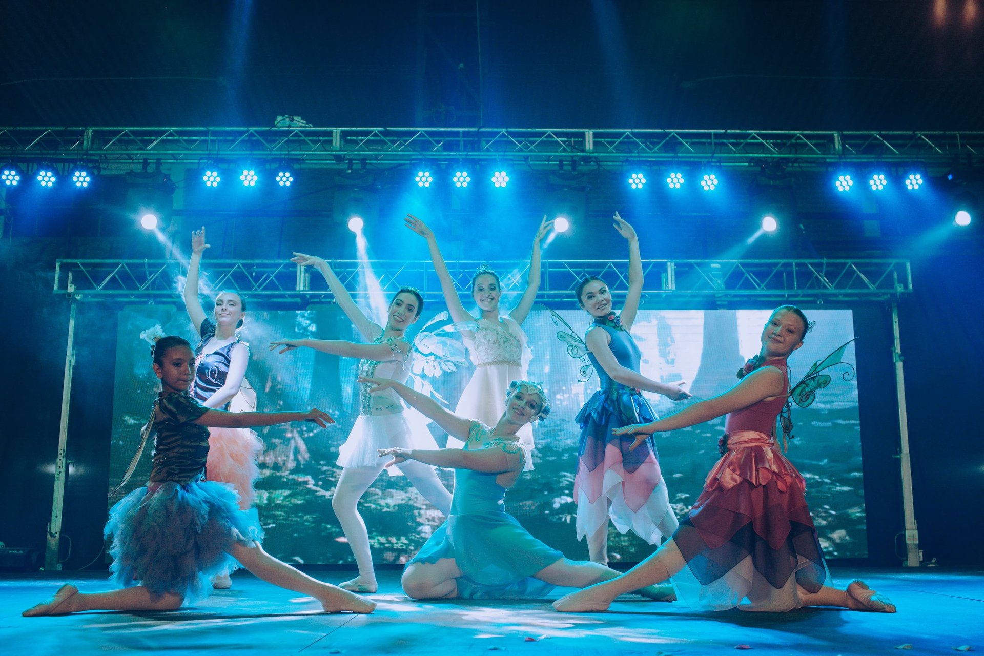 two woman dancing on the stage