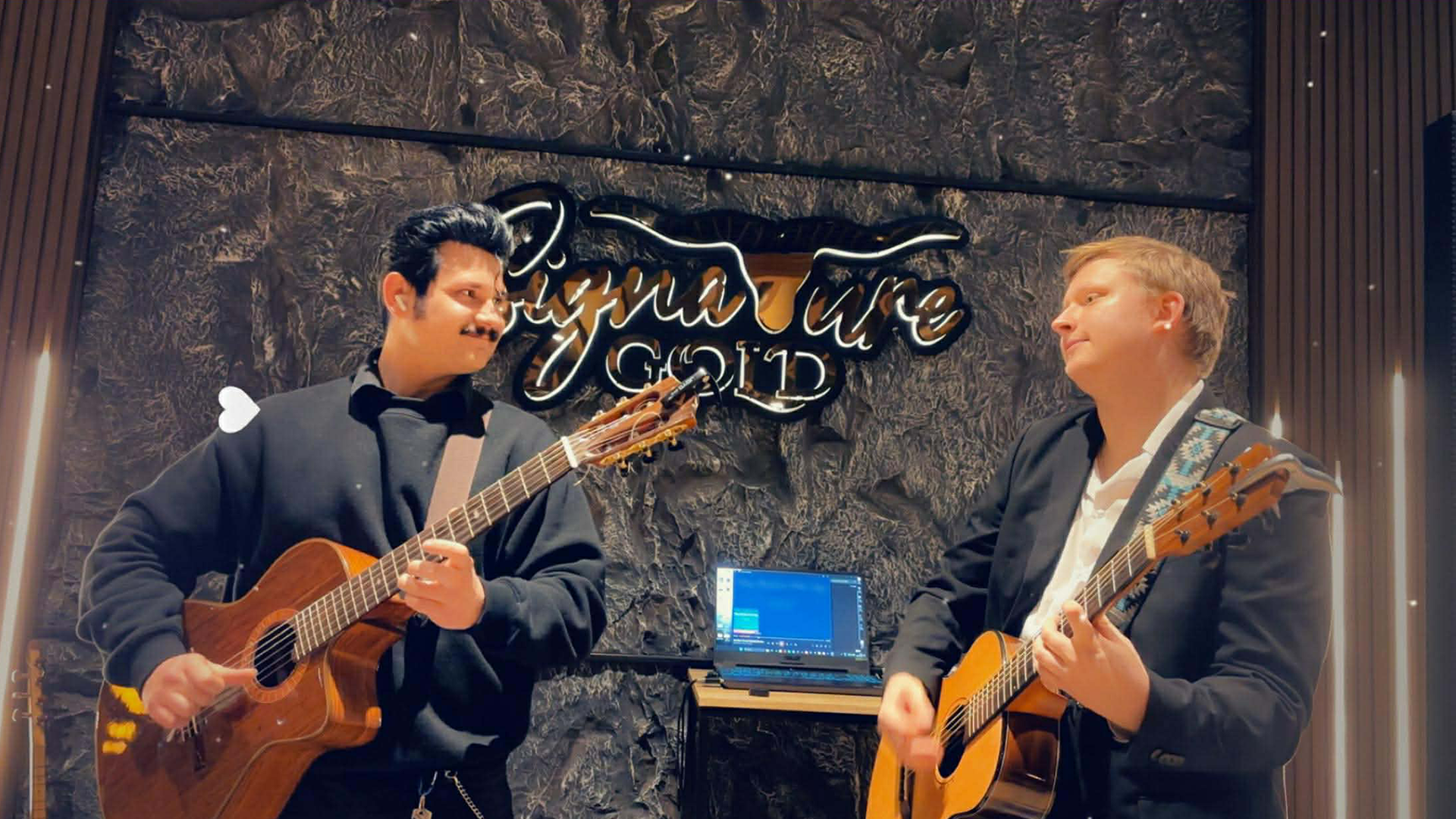 a close up of a black and brown abstract painting