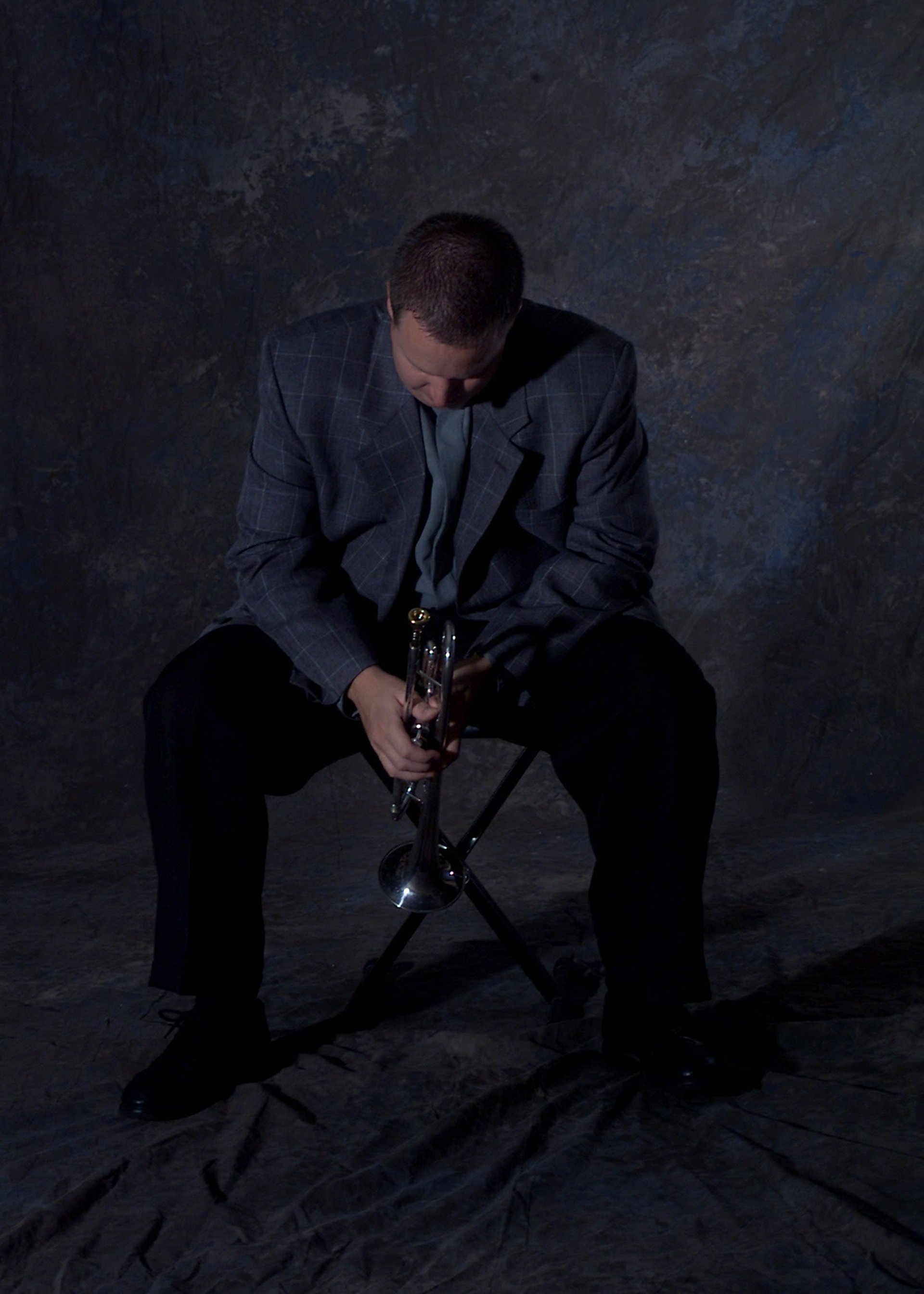 woman wearing yellow long-sleeved dress under white clouds and blue sky during daytime