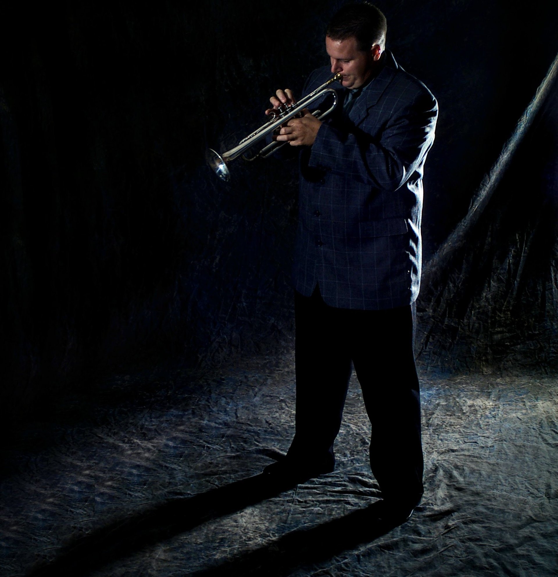 woman wearing yellow long-sleeved dress under white clouds and blue sky during daytime
