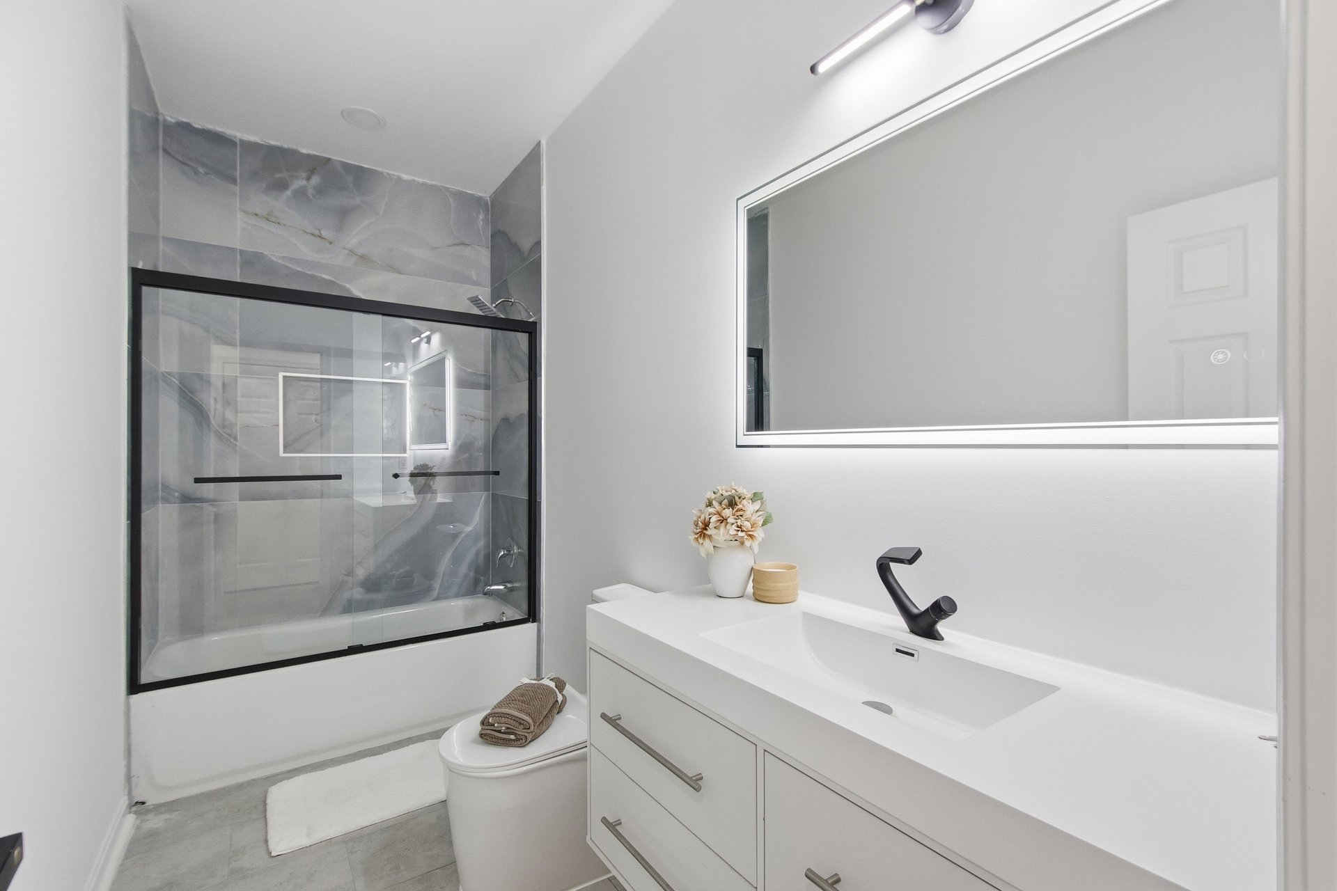 Shower remodel Springfield VA glass panel install