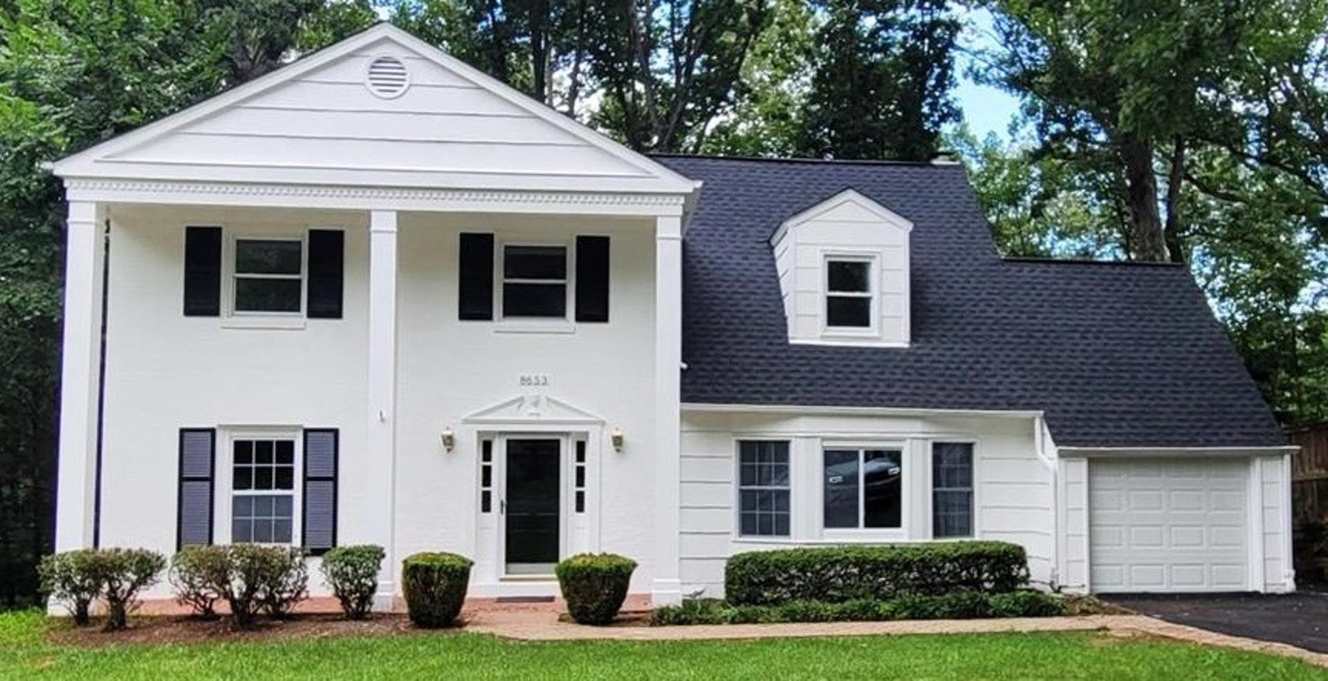 black and brown leather padded tub sofa