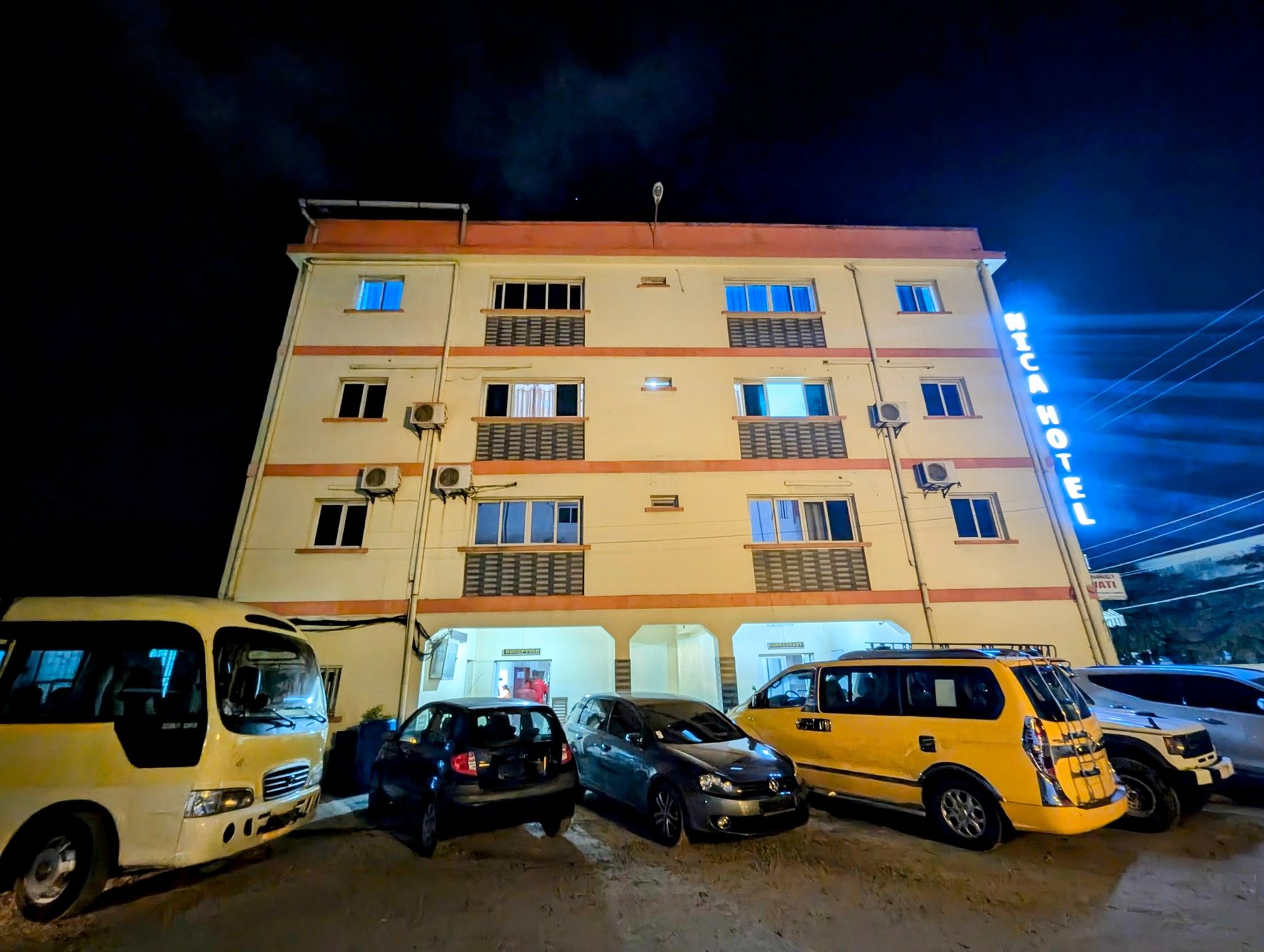 black and brown leather padded tub sofa