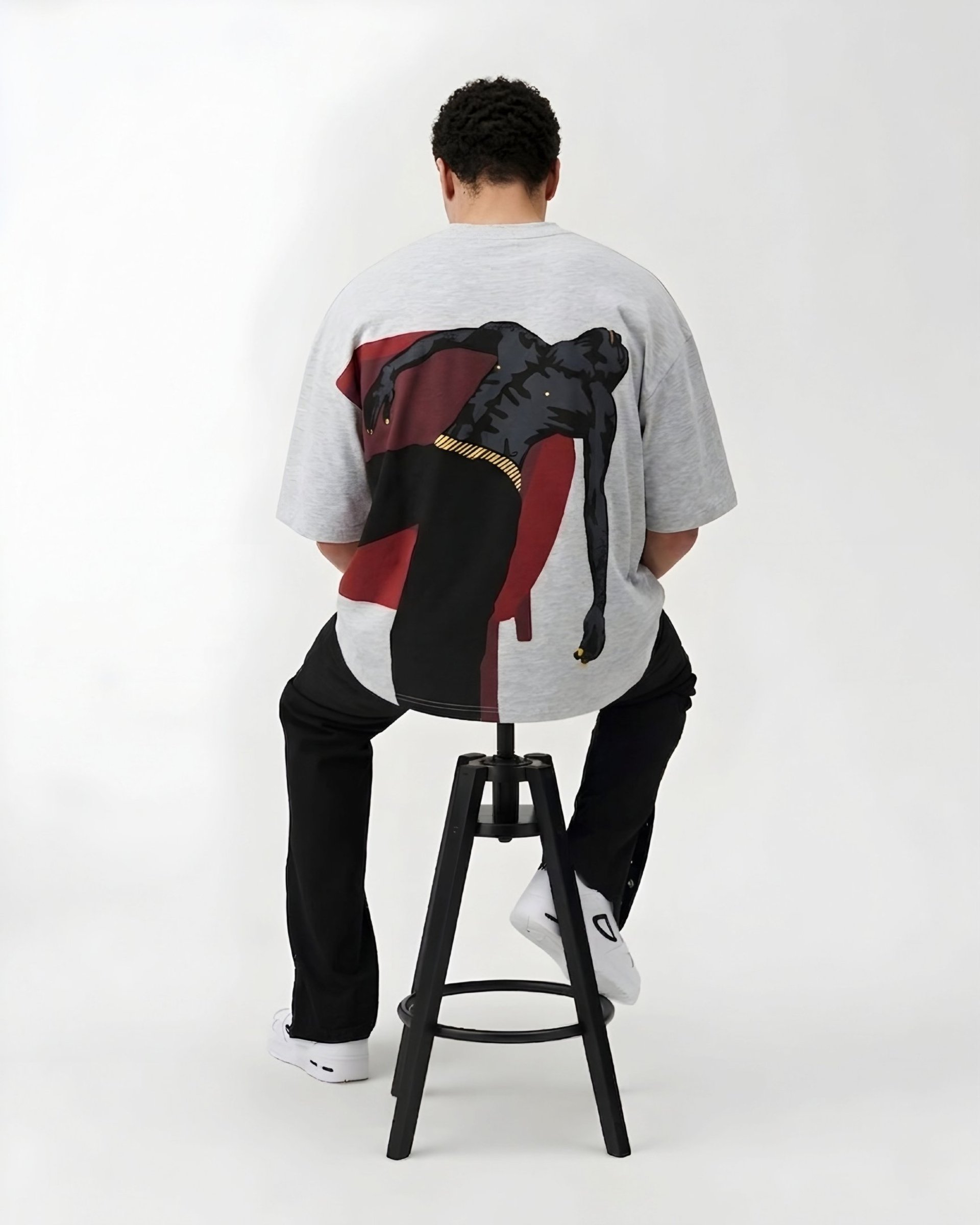 person wearing grey knit sweater