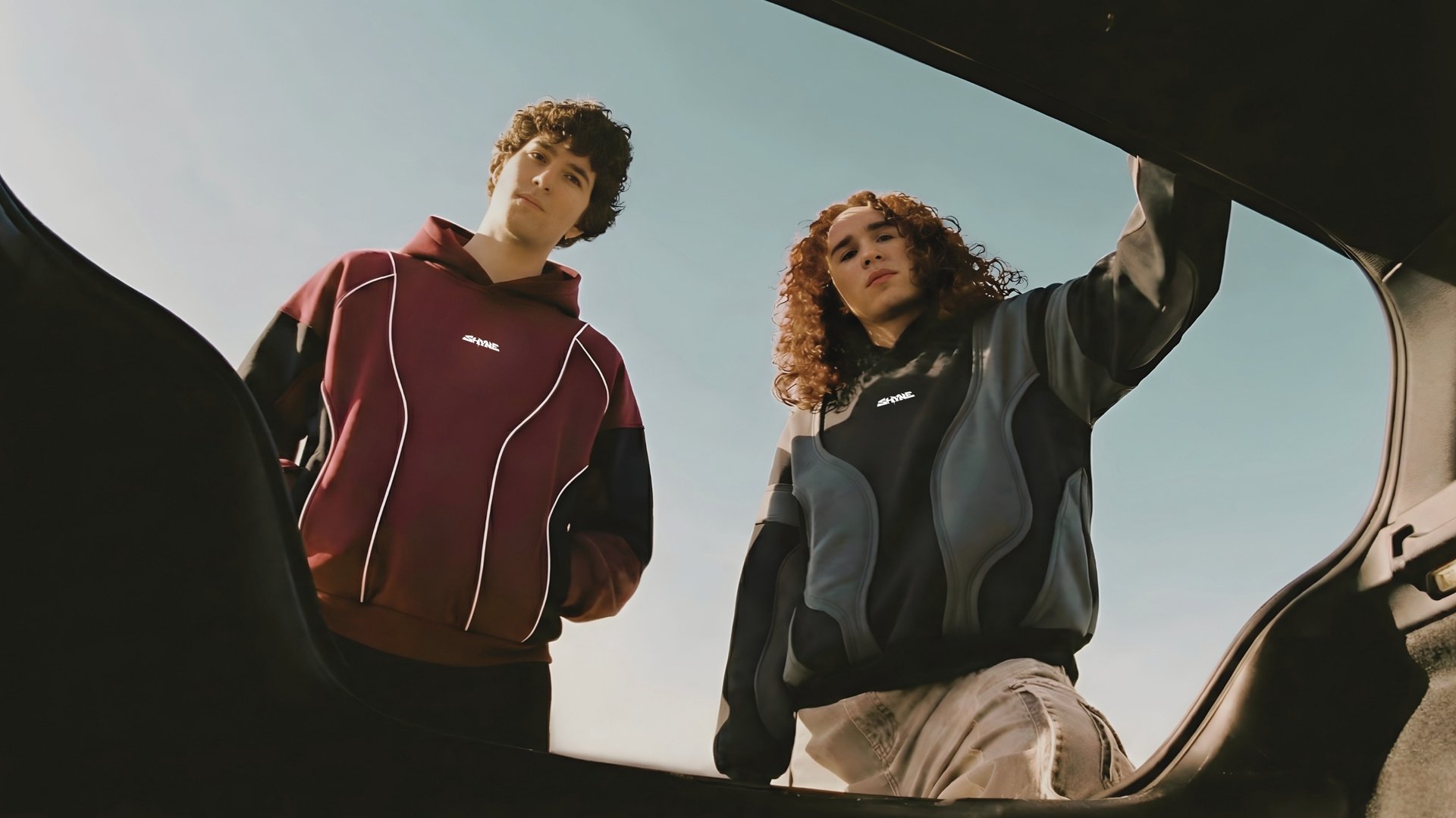 person wearing grey knit sweater