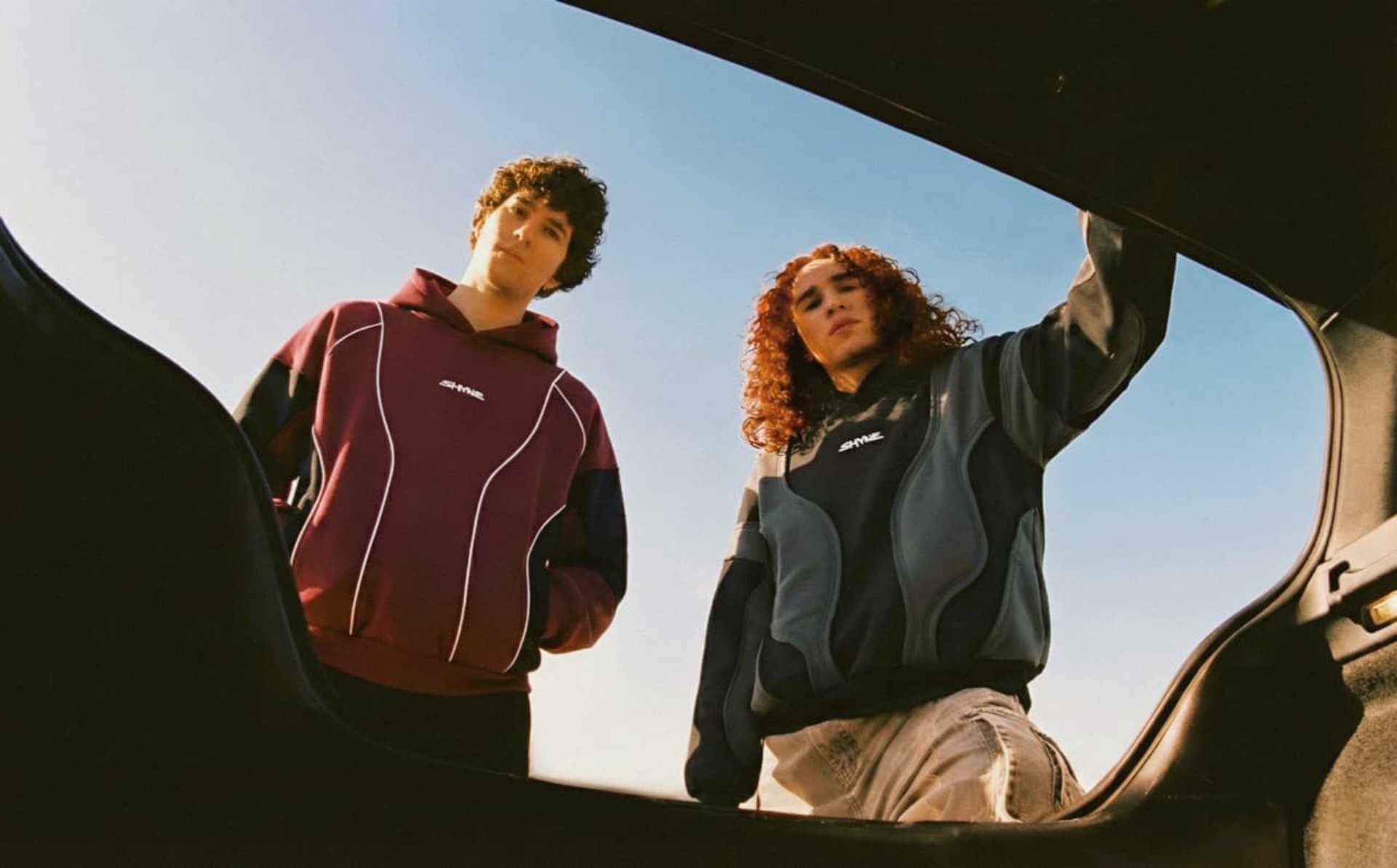 person wearing grey knit sweater