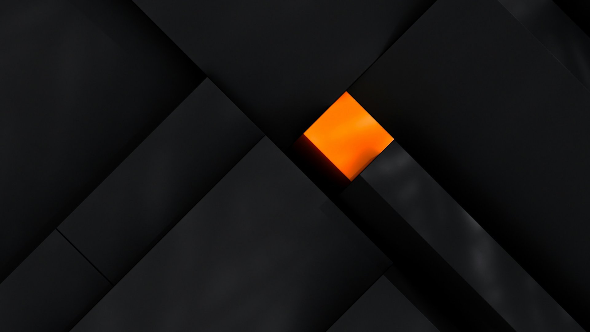 a black and orange background with a square in the center