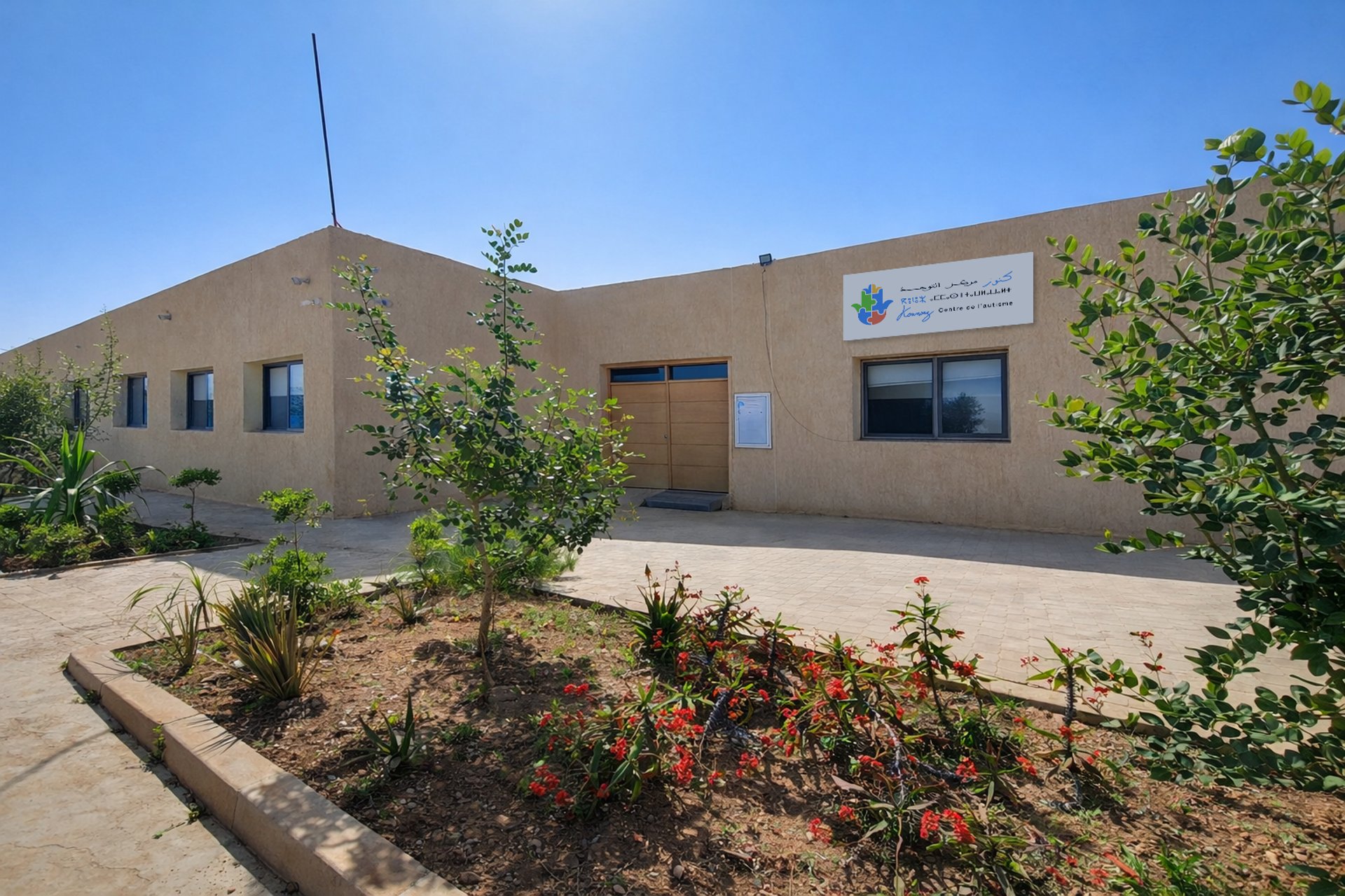 Father and son playing chess on the floor.