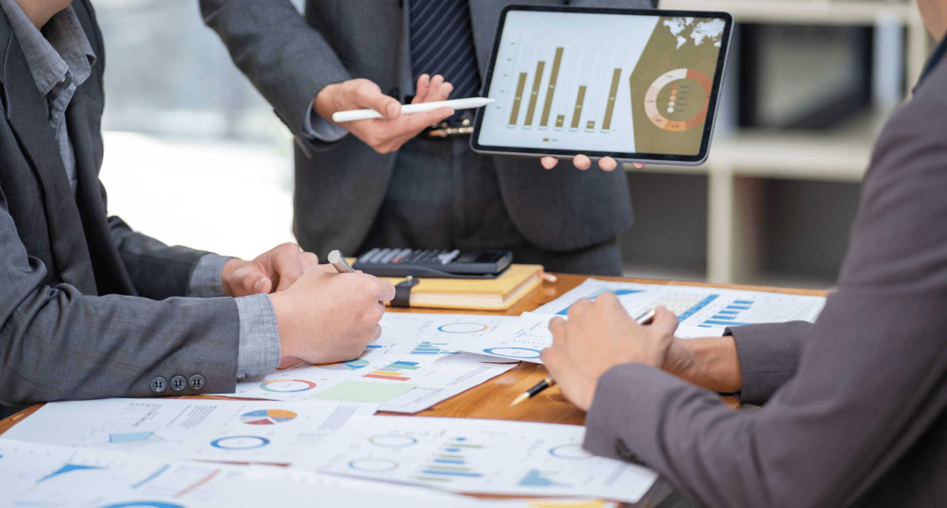 group of people using laptop computer