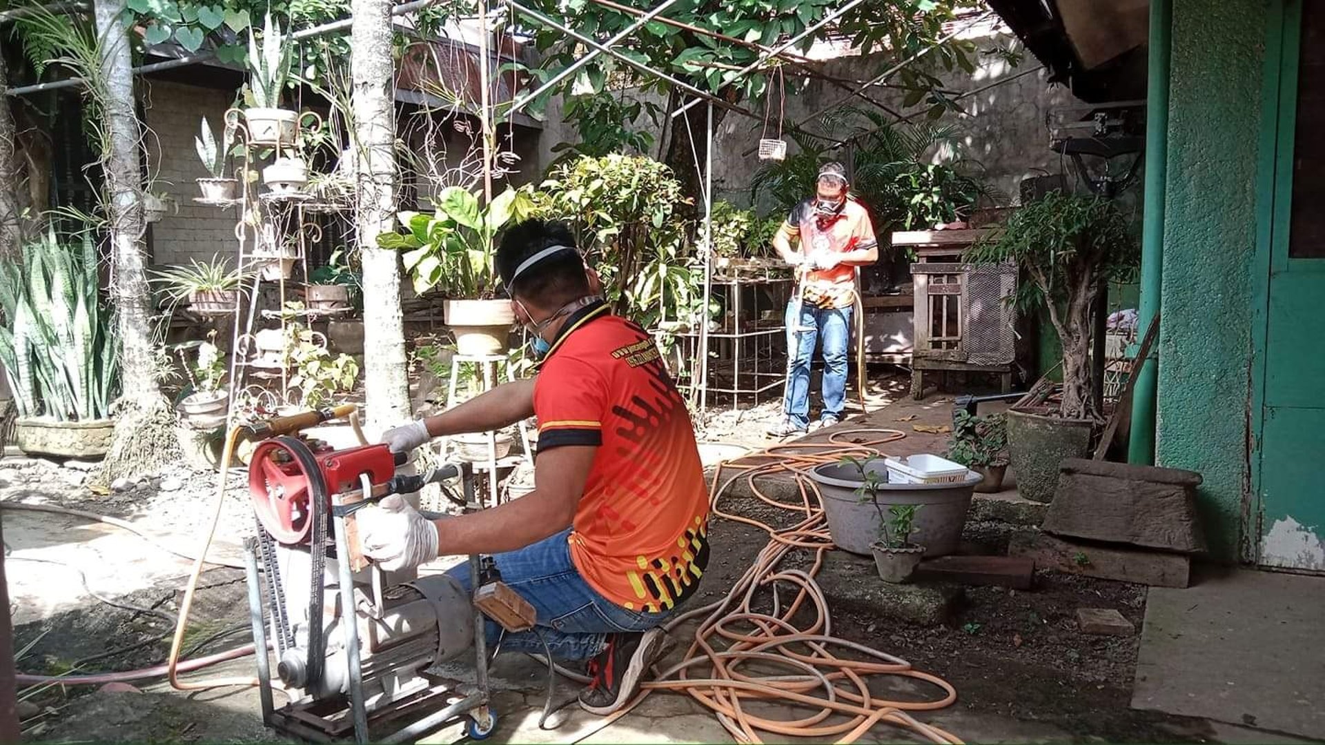 a man working on a piece of wood