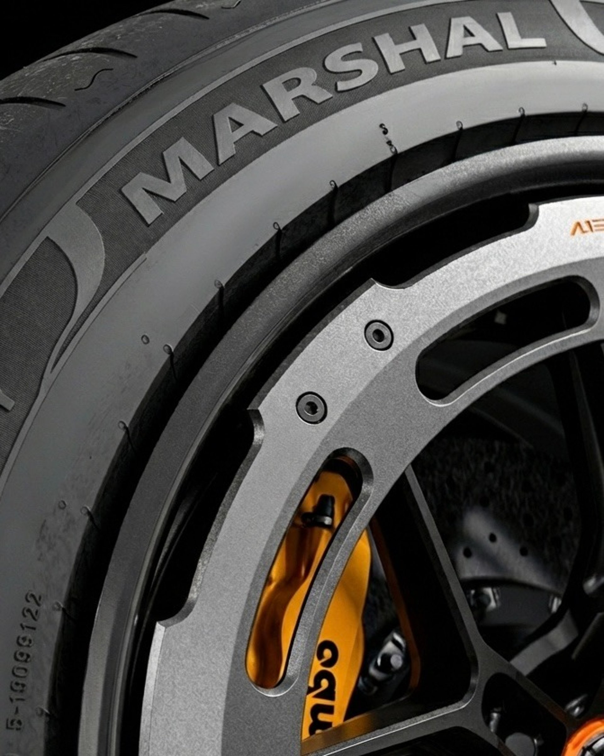 black and red car wheel