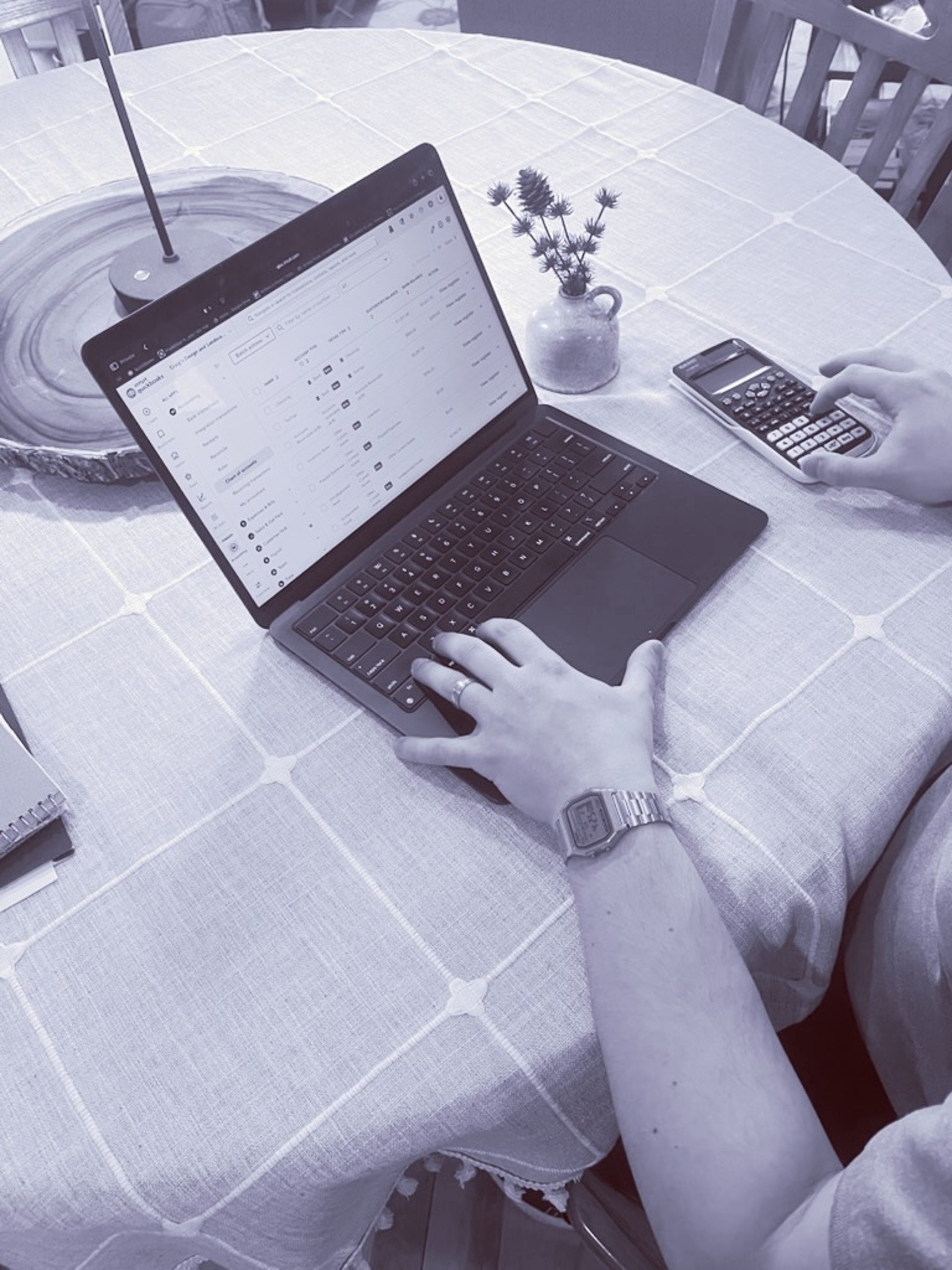 a person is writing on a piece of paper