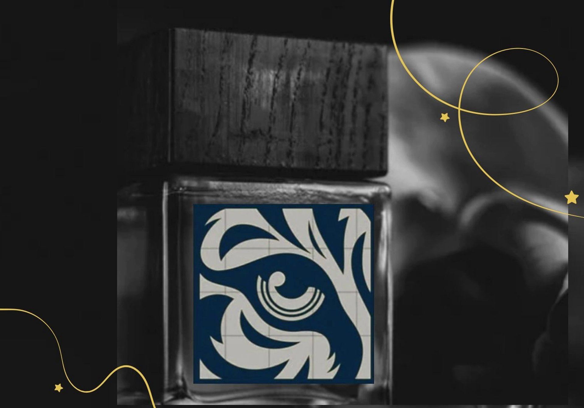 selective focus photography of clear glass perfume bottle