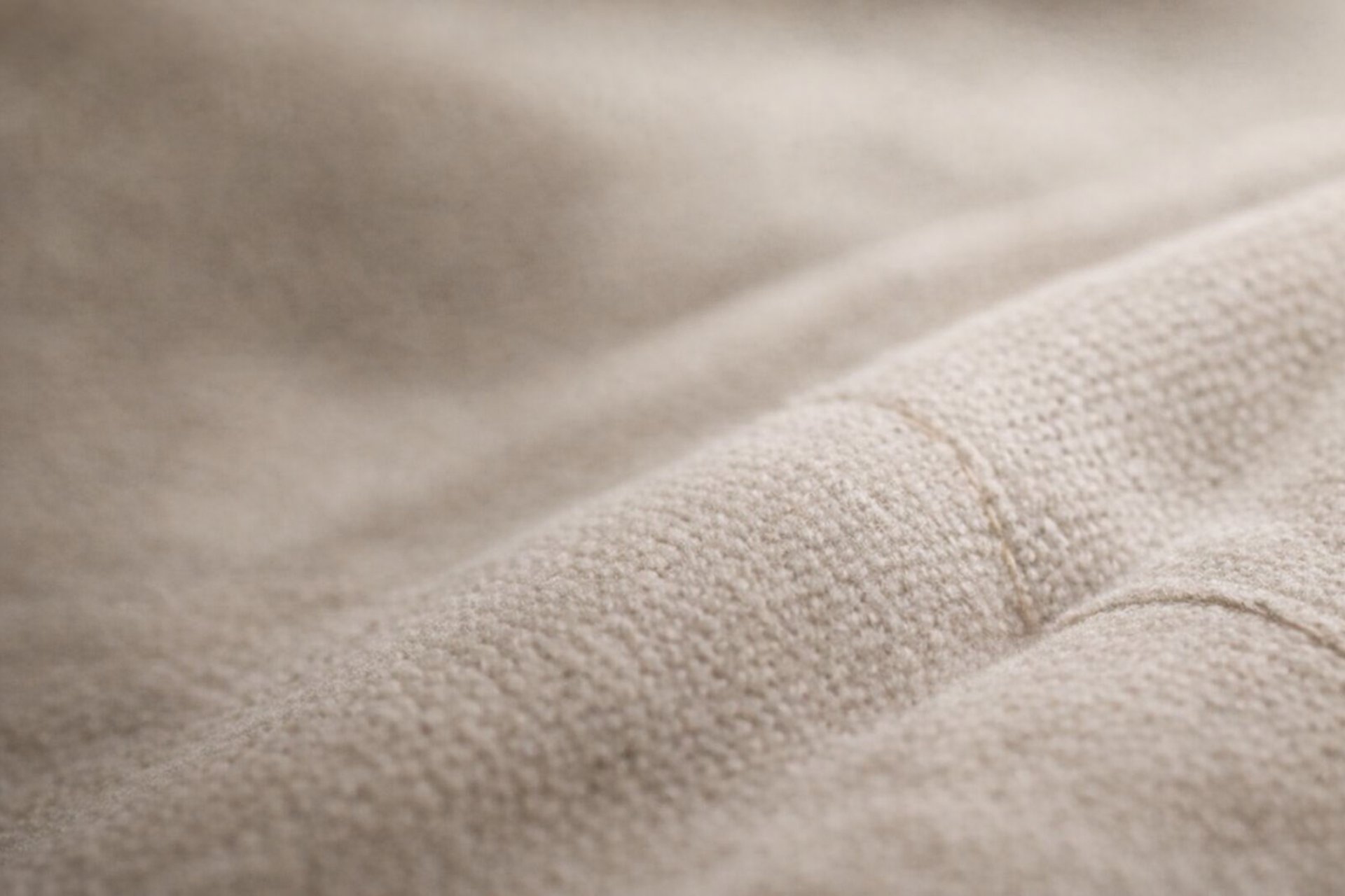 a living room with a couch a chair and a table