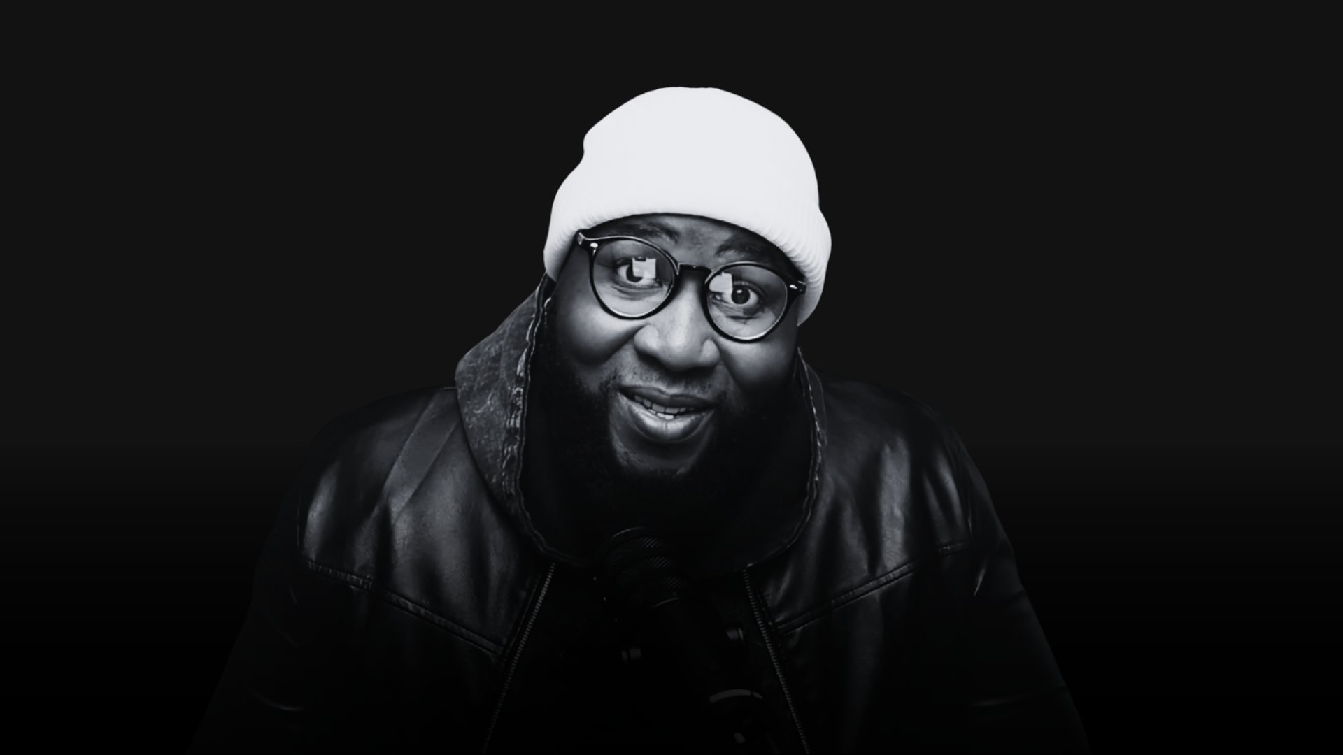 an abstract photo of a curved building with a blue sky in the background