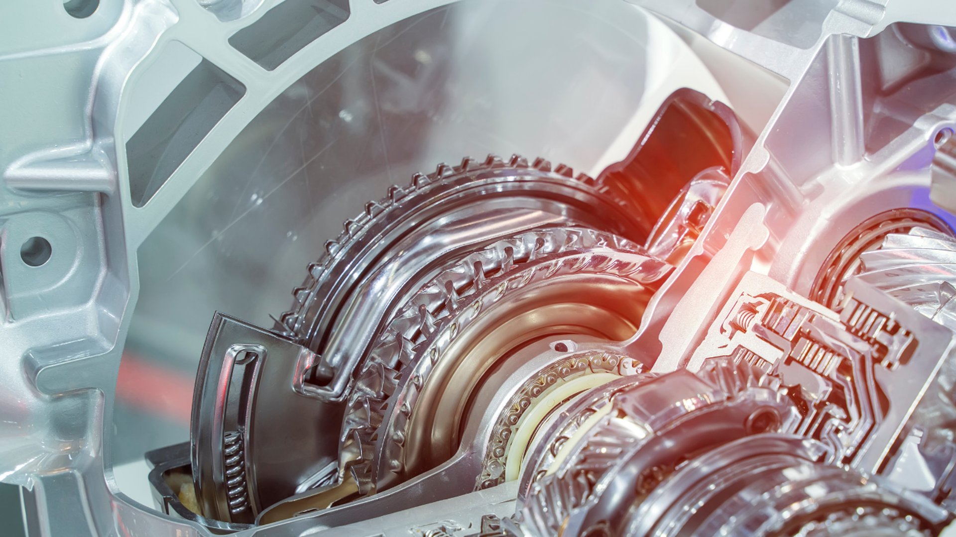 an abstract photo of a curved building with a blue sky in the background