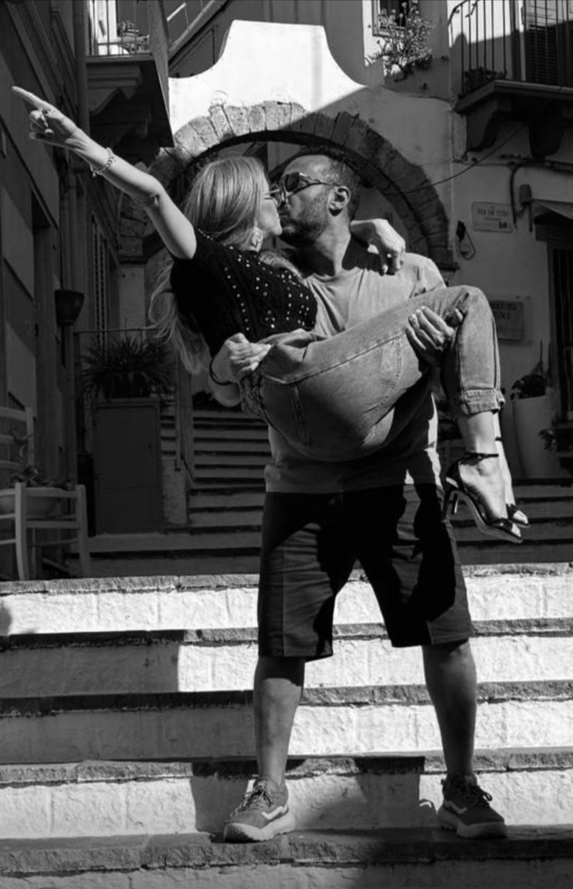 couple wearing silver-colored rings