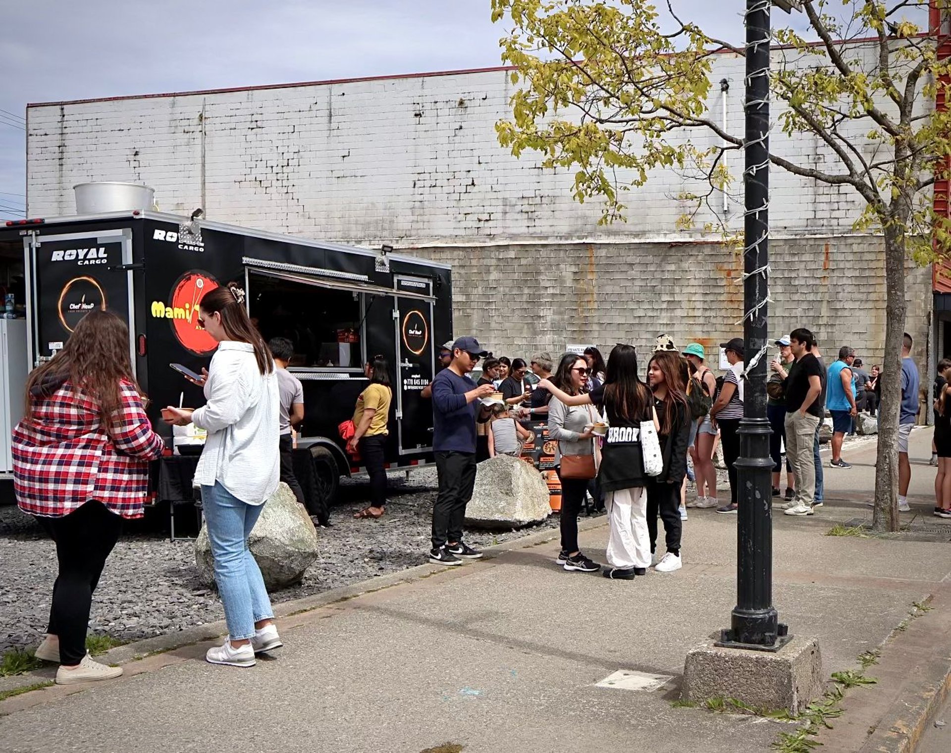 woman wearing yellow long-sleeved dress under white clouds and blue sky during daytime