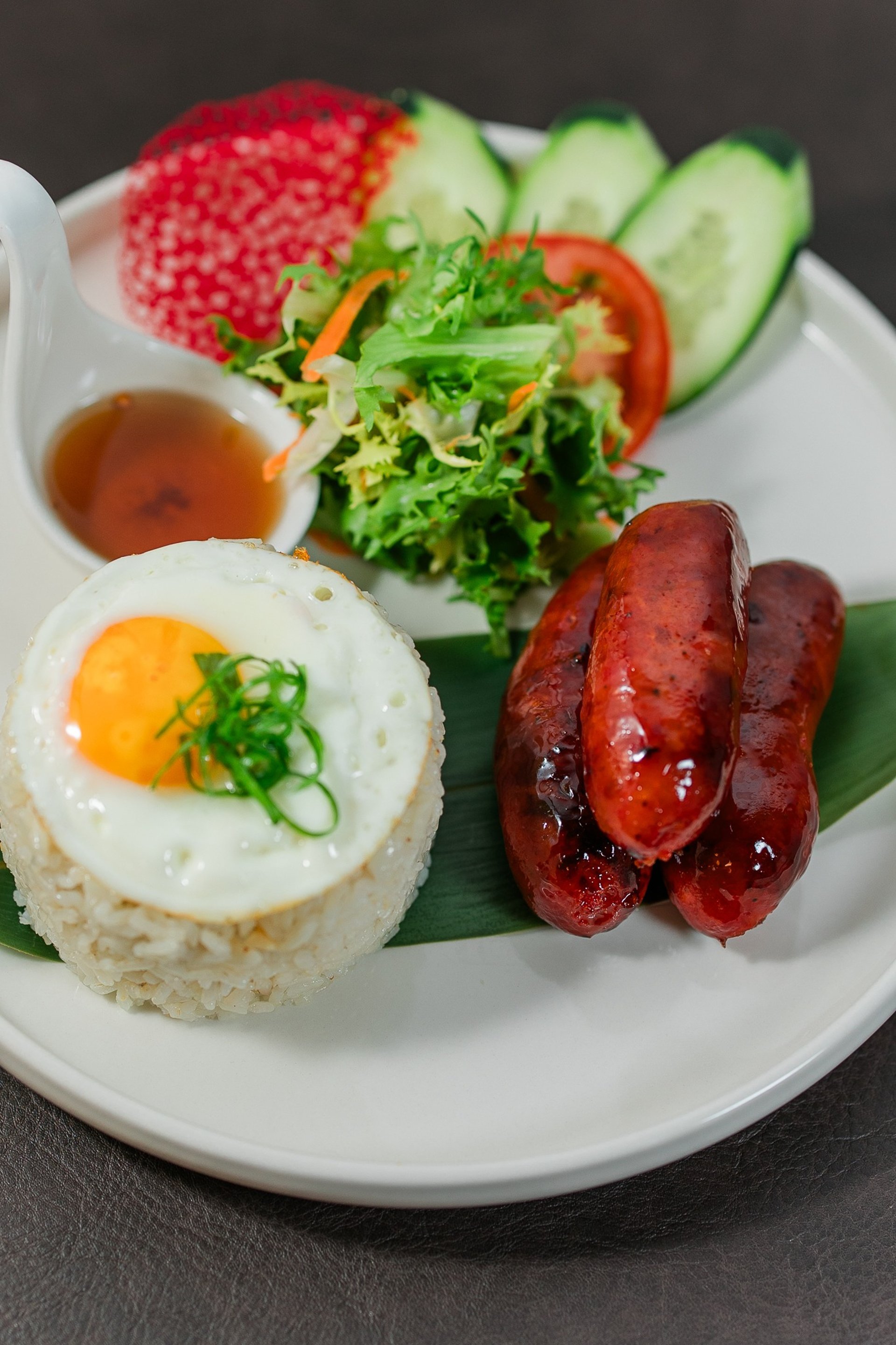 an abstract photo of a curved building with a blue sky in the background