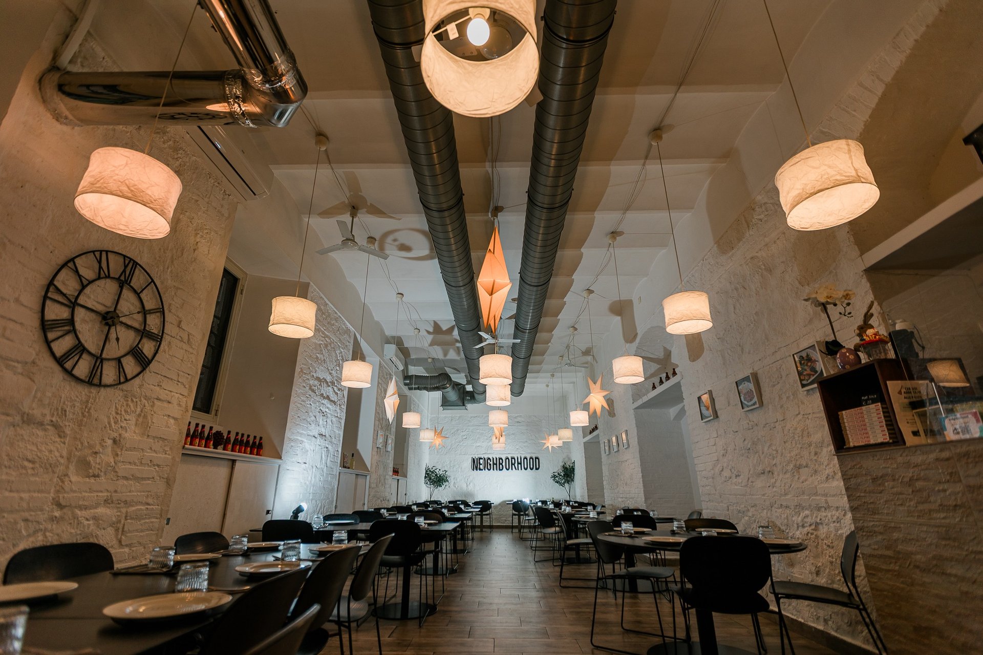 an abstract photo of a curved building with a blue sky in the background