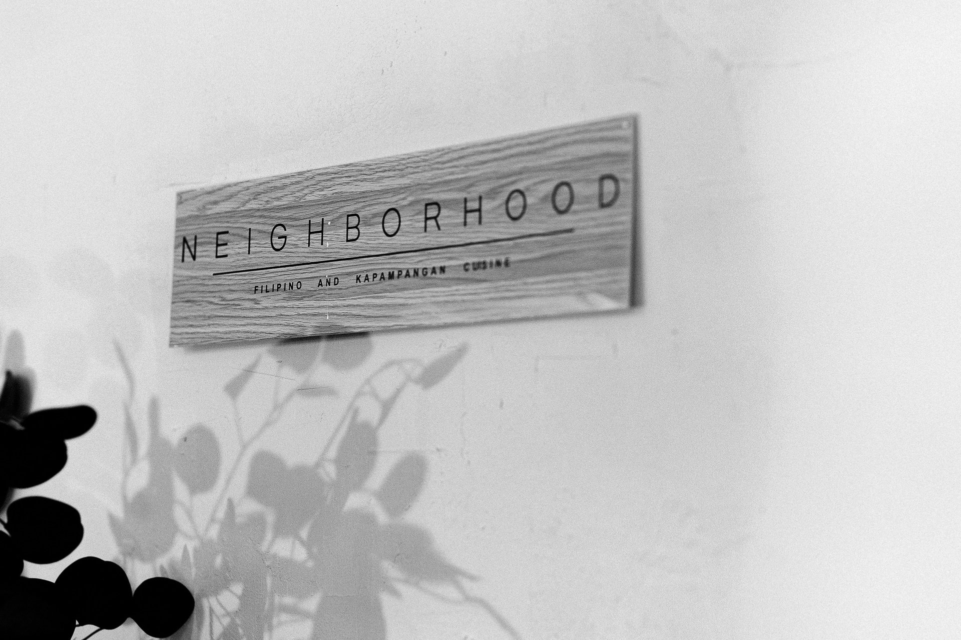 an abstract photo of a curved building with a blue sky in the background