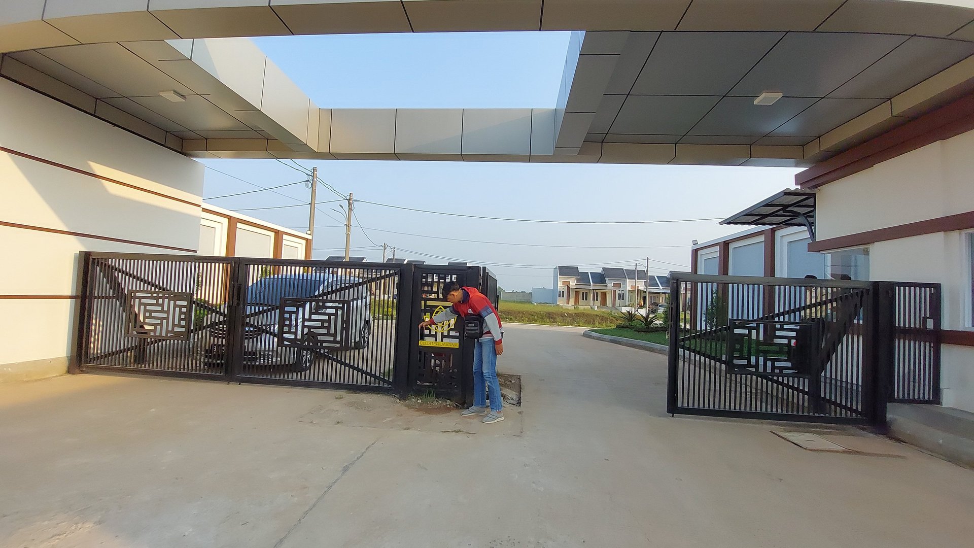 woman wearing yellow long-sleeved dress under white clouds and blue sky during daytime